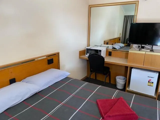 Bed in True blue Motor Inn