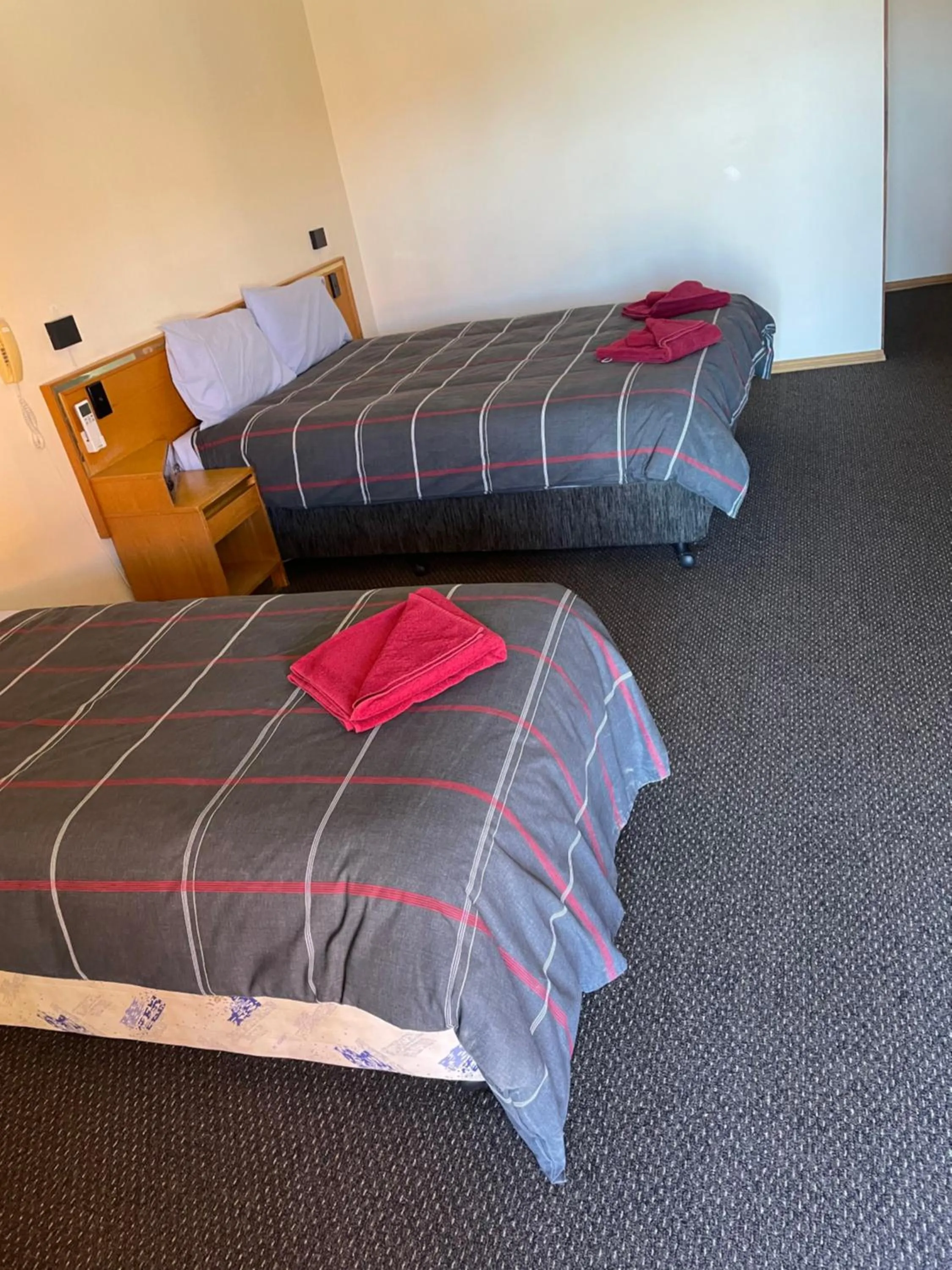 Bed in True blue Motor Inn