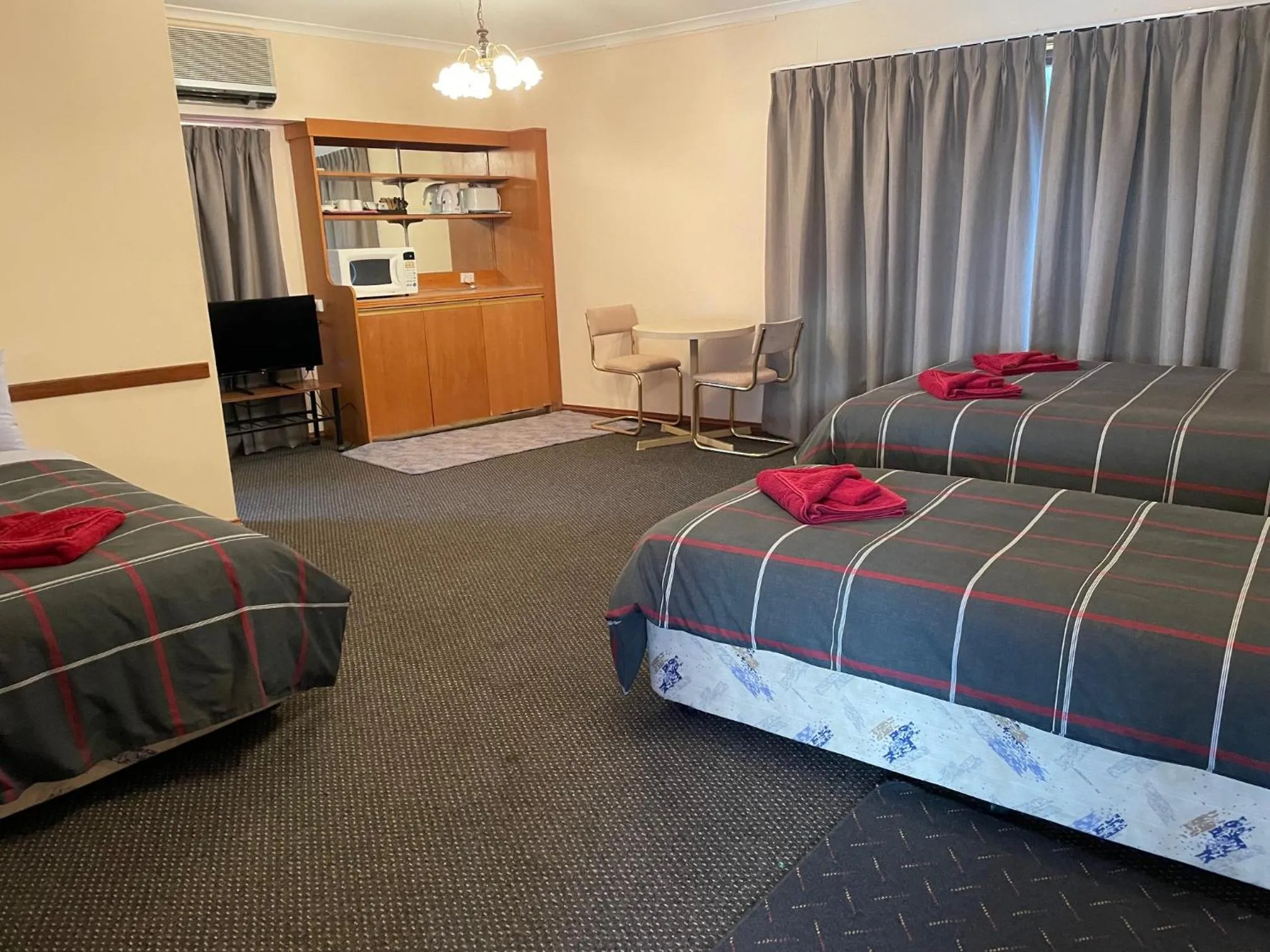 Bed in True blue Motor Inn