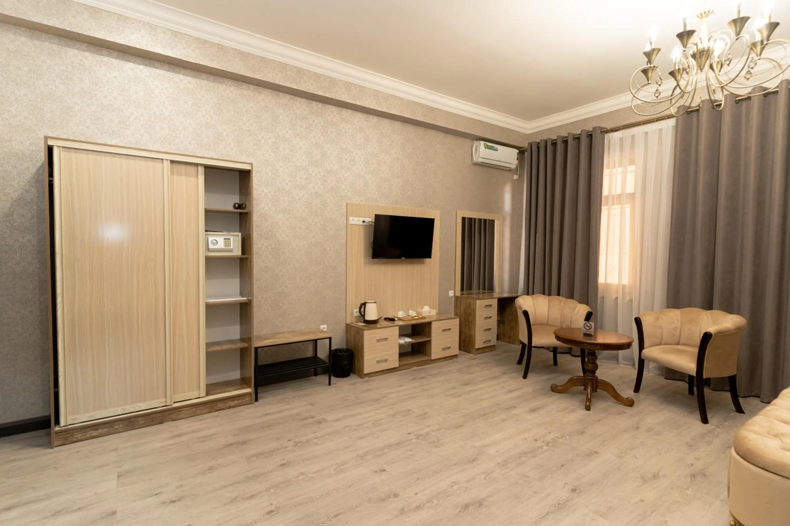 Communal lounge/ TV room in The Heritage Tashkent