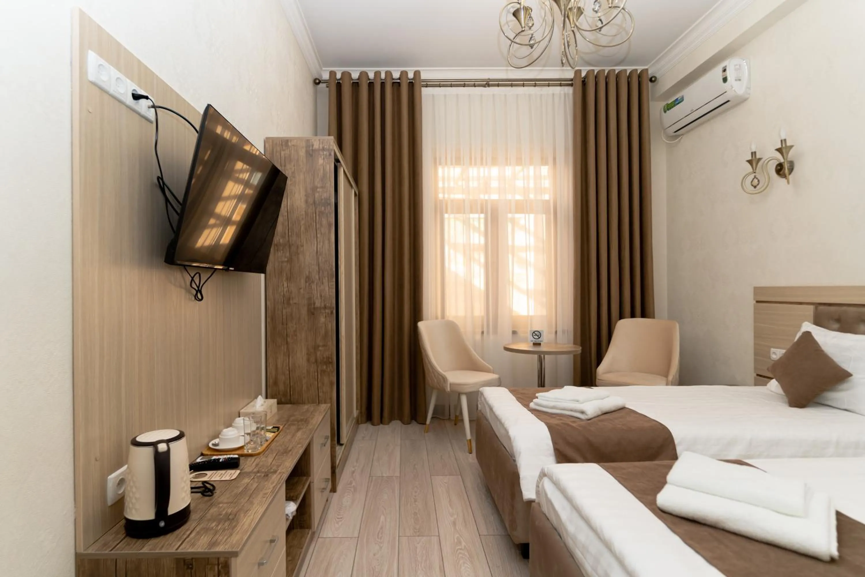 Photo of the whole room, Bed in The Heritage Tashkent