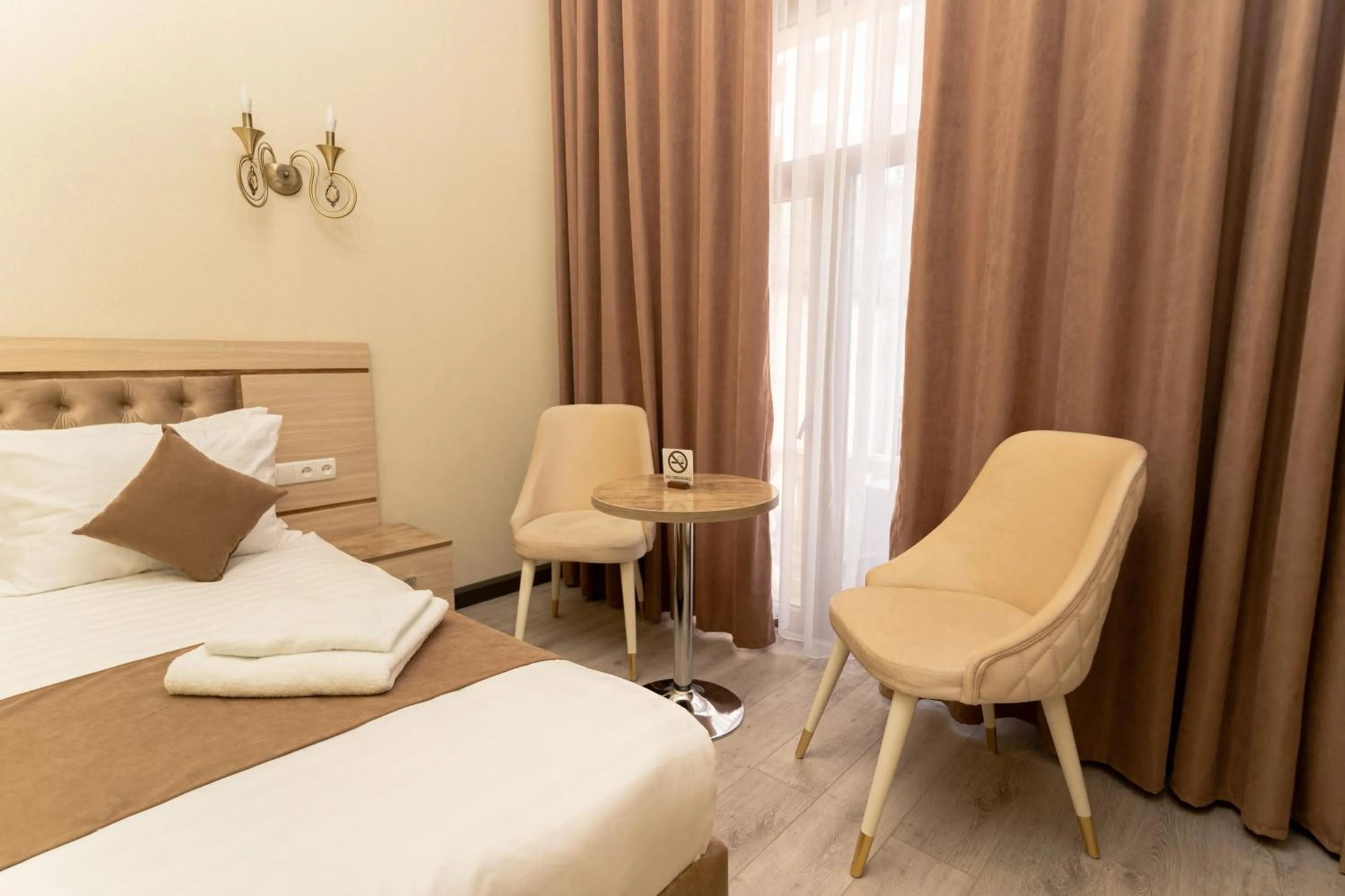 Photo of the whole room, Bed in The Heritage Tashkent