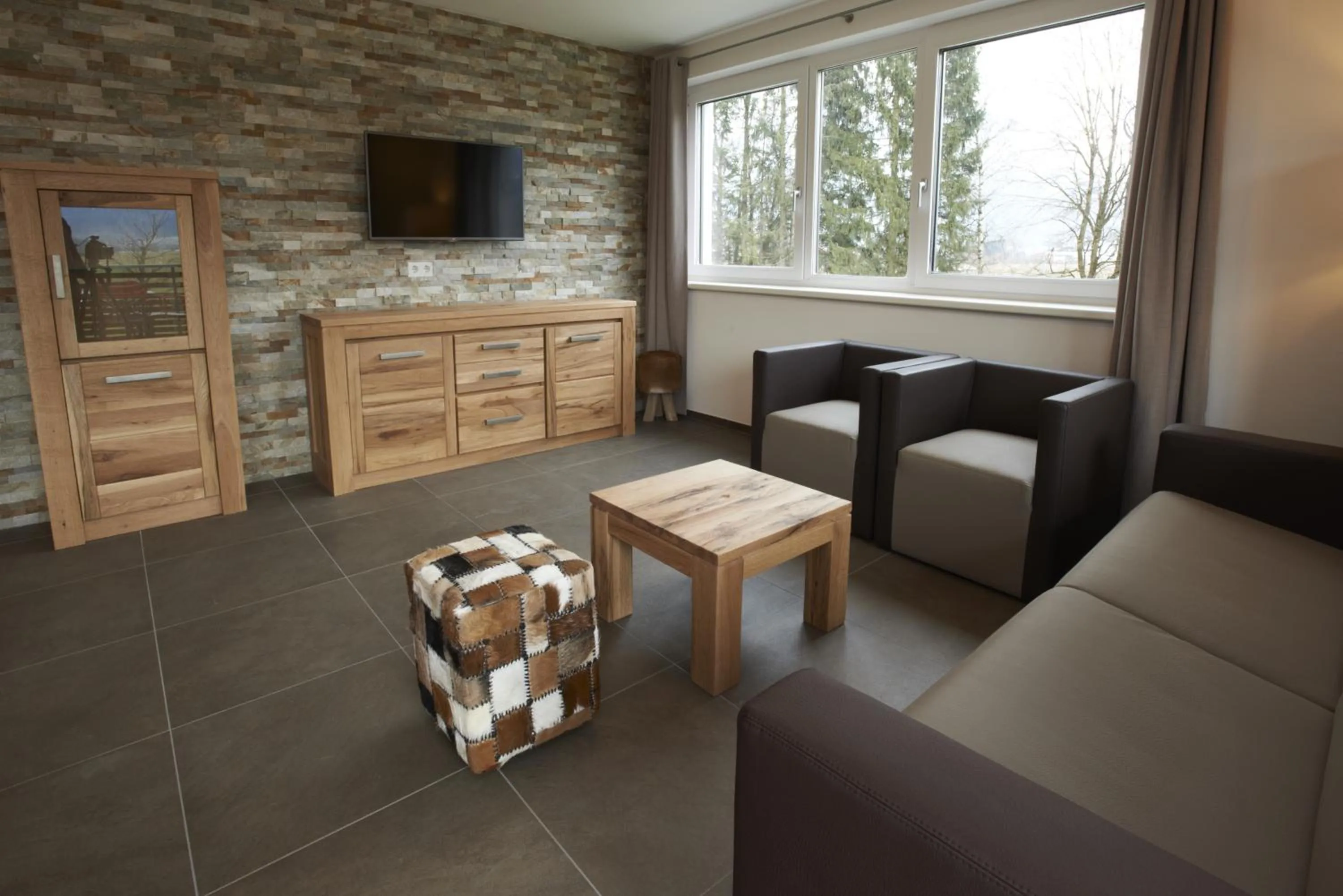 Living room in Ski & Golf Suites Zell am See by Alpin Rentals