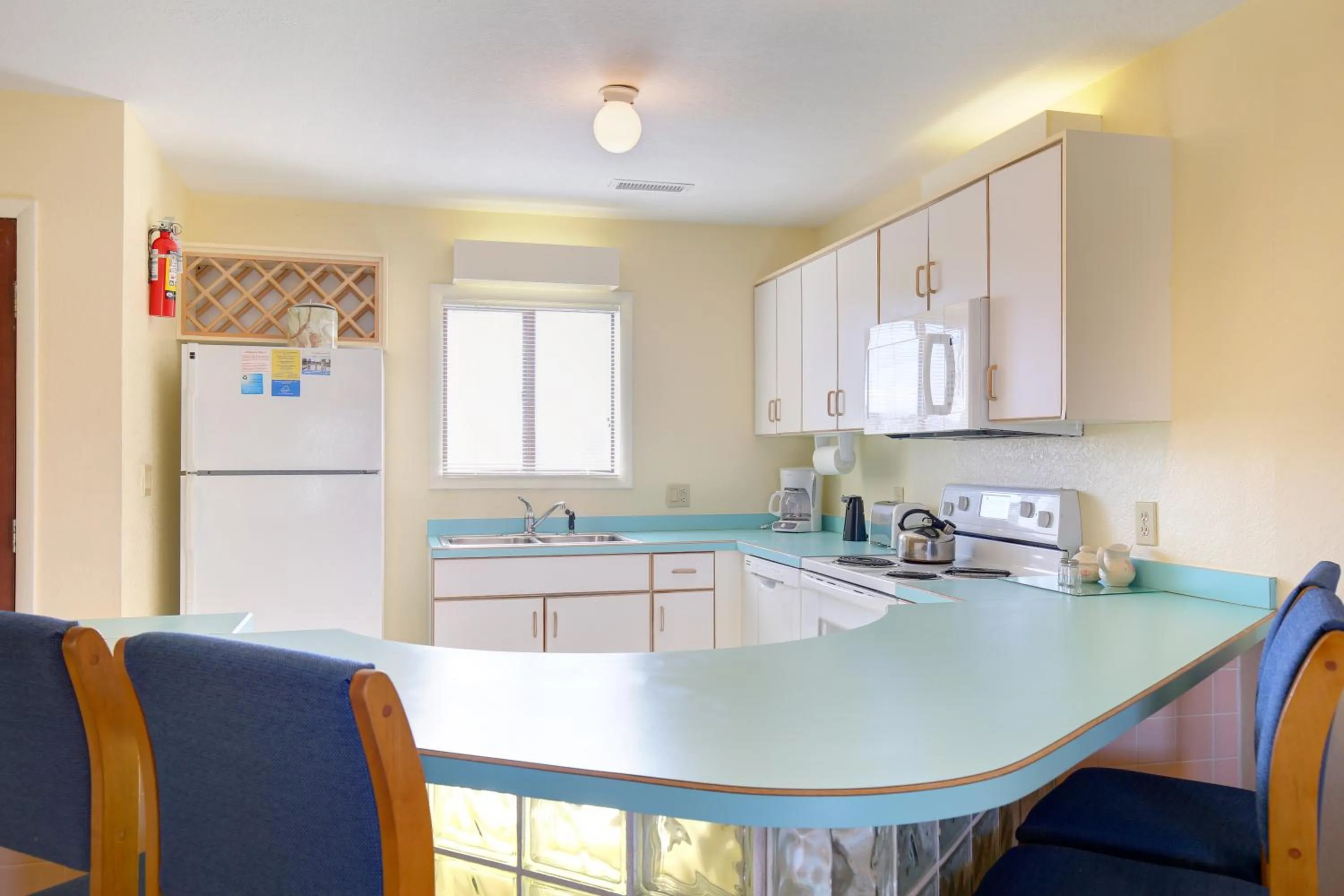 Kitchen or kitchenette in Sea Scape Beach and Golf Villas