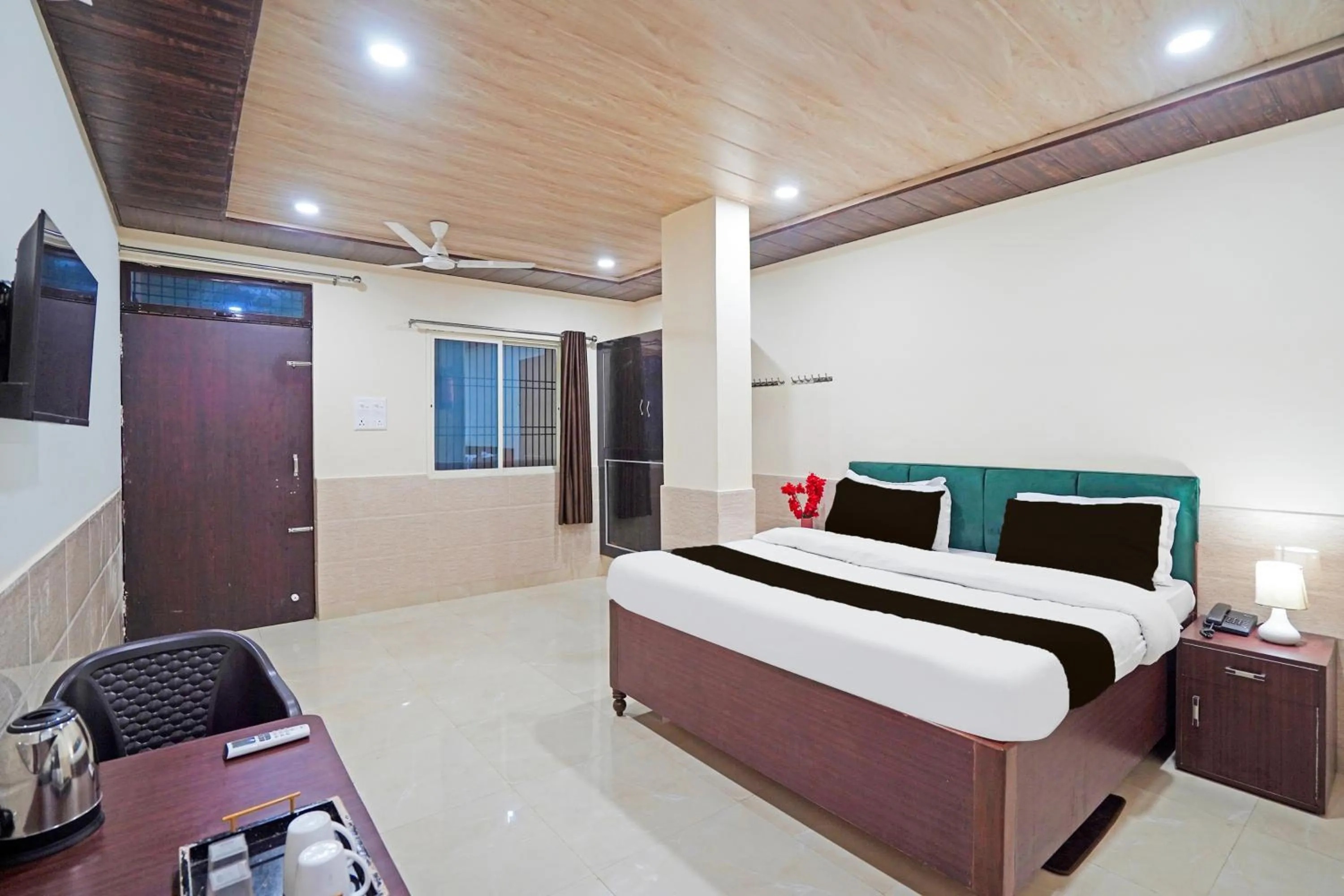 Bedroom, Bed in Super Hotel O Varanasi Banaras Junction Formerly Girija Palace