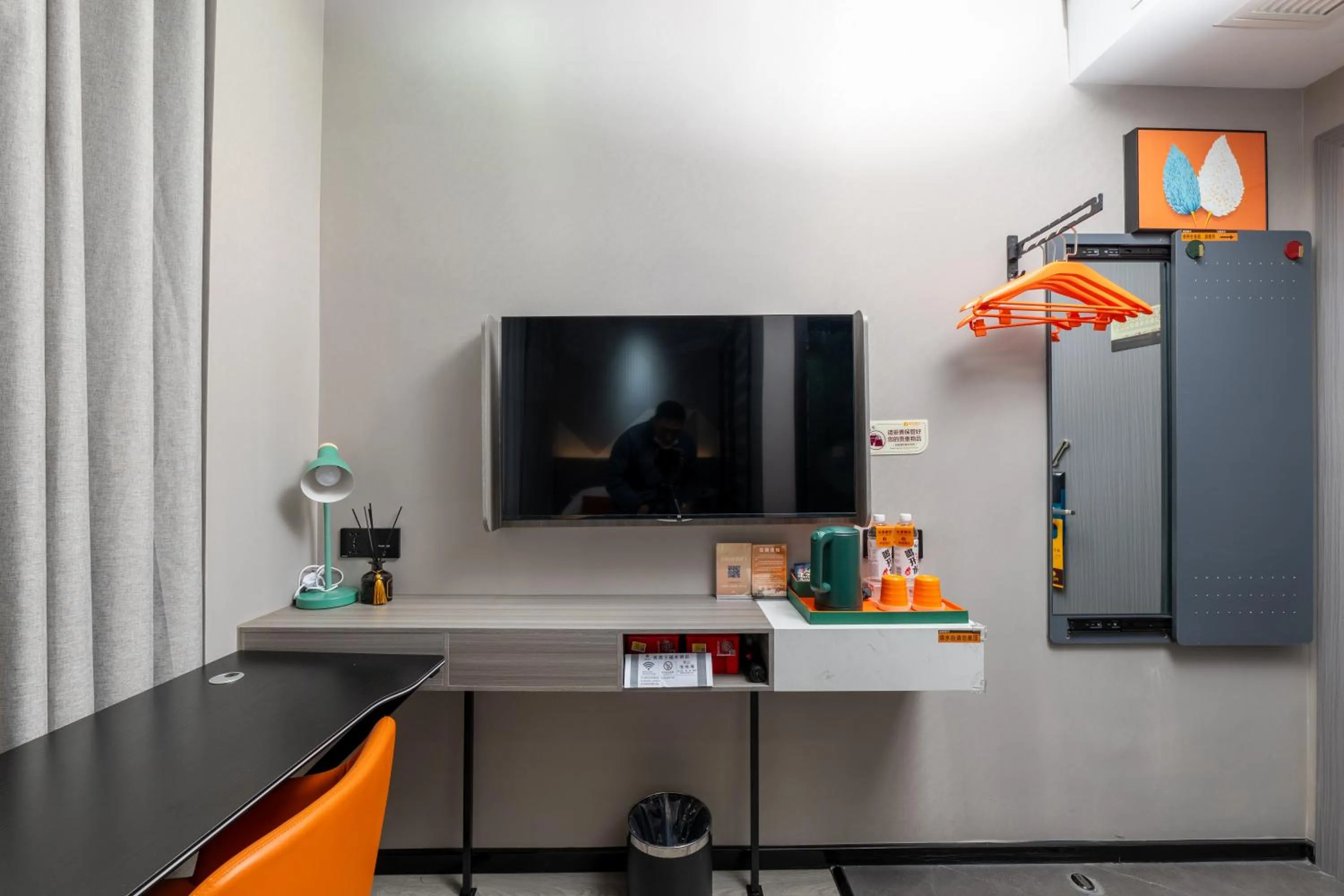 TV and multimedia in Orient Rose International Hotel