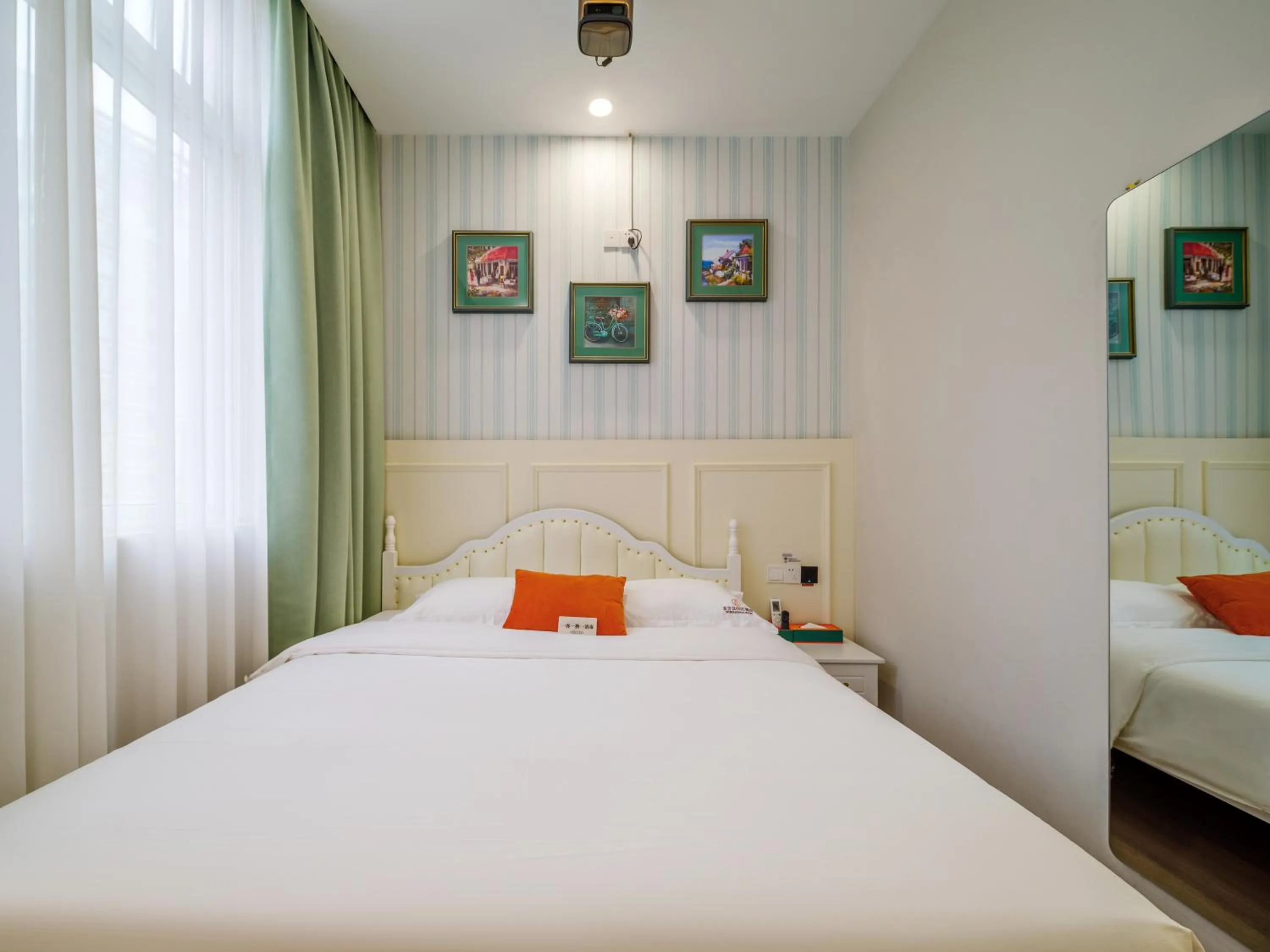 Bed in Orient Rose International Hotel