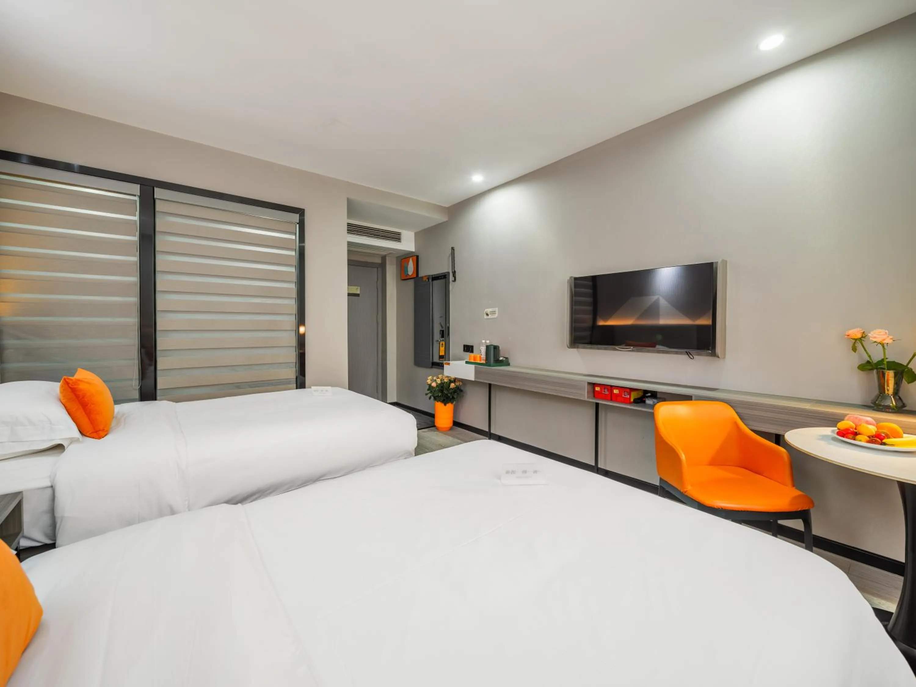 Bed in Orient Rose International Hotel