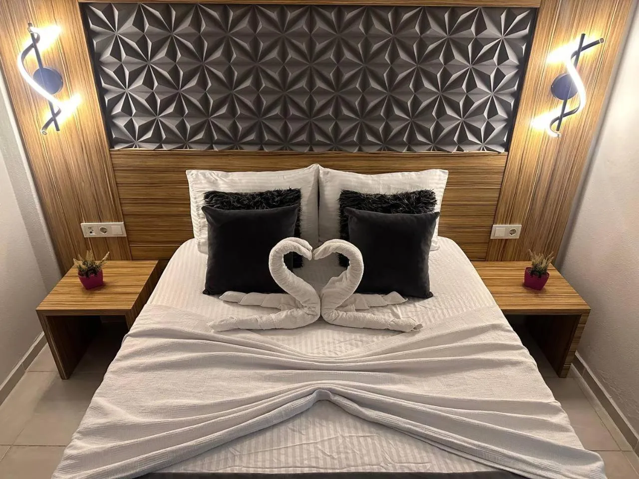 Bed in Royal Ezel Hotel