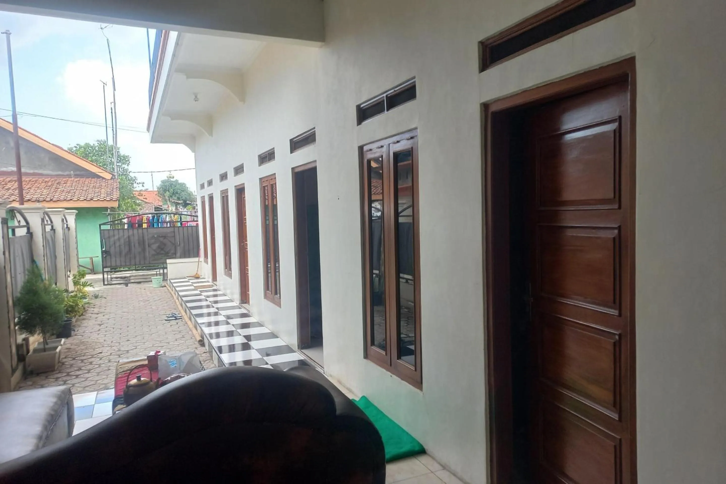 Lobby or reception in Hotel O Chimi Rumah Kost