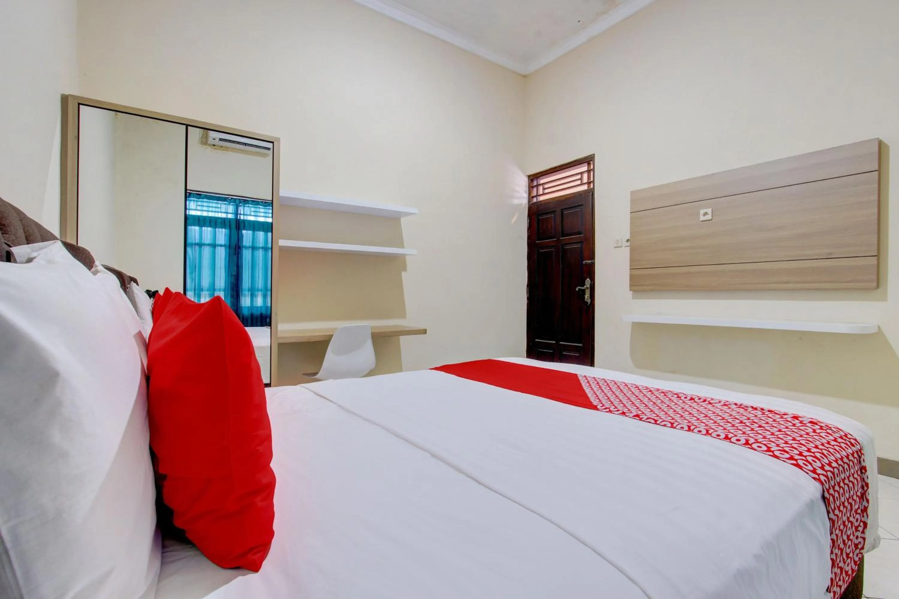 Bedroom, Bed in Hotel O Delia Inn Syariah