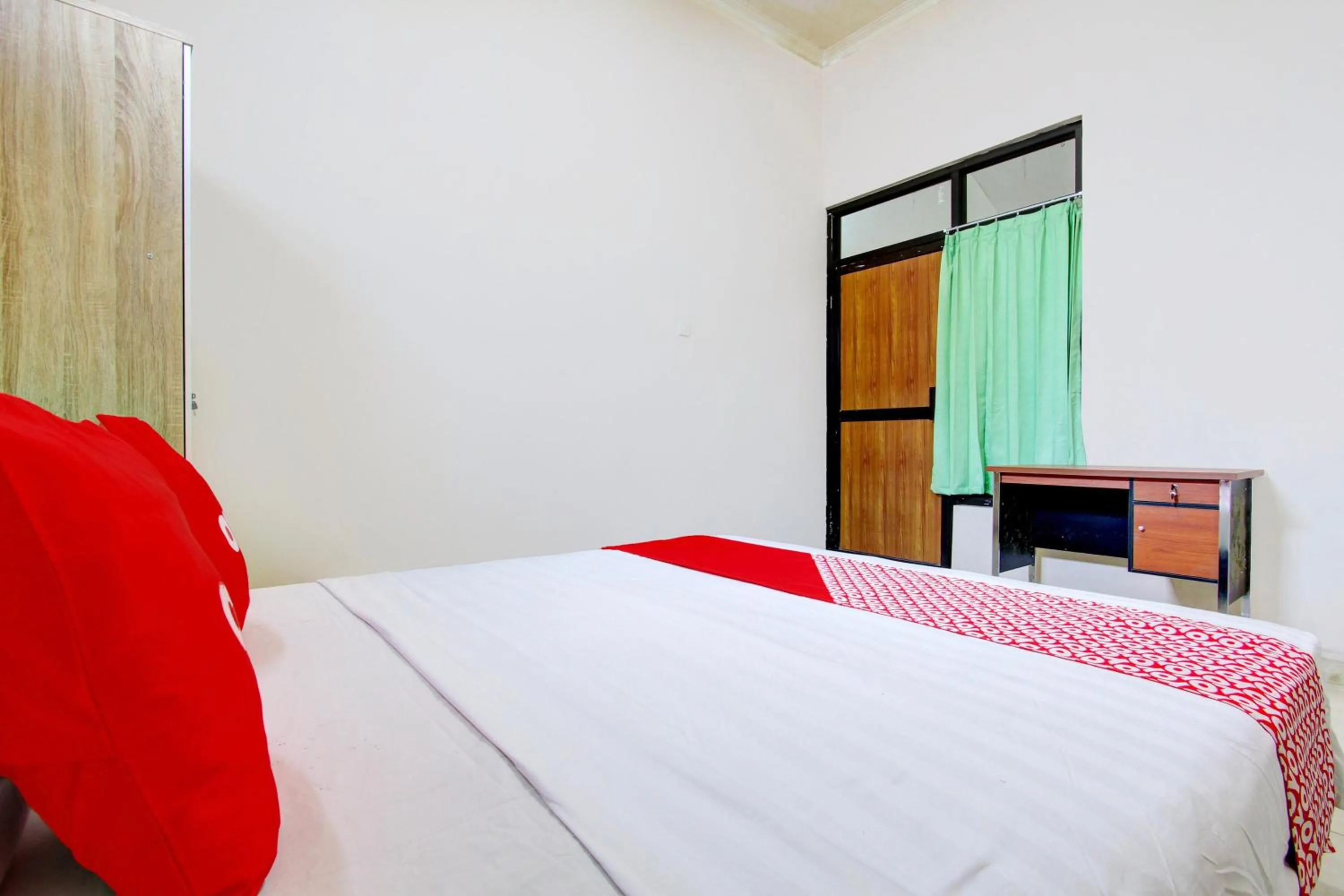Bedroom, Bed in Hotel O Delia Inn Syariah