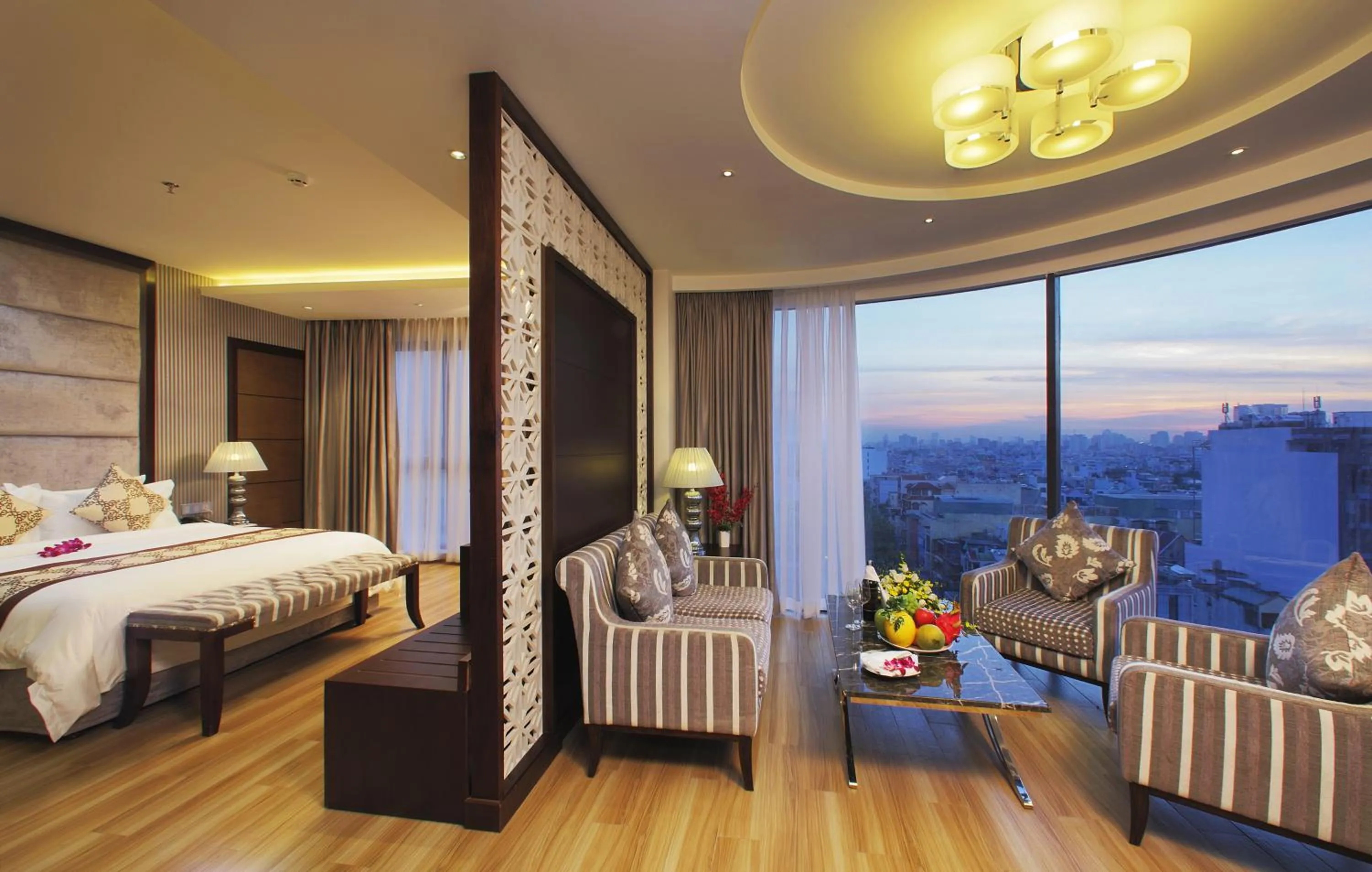 Living room, Bed in Athena Hotel