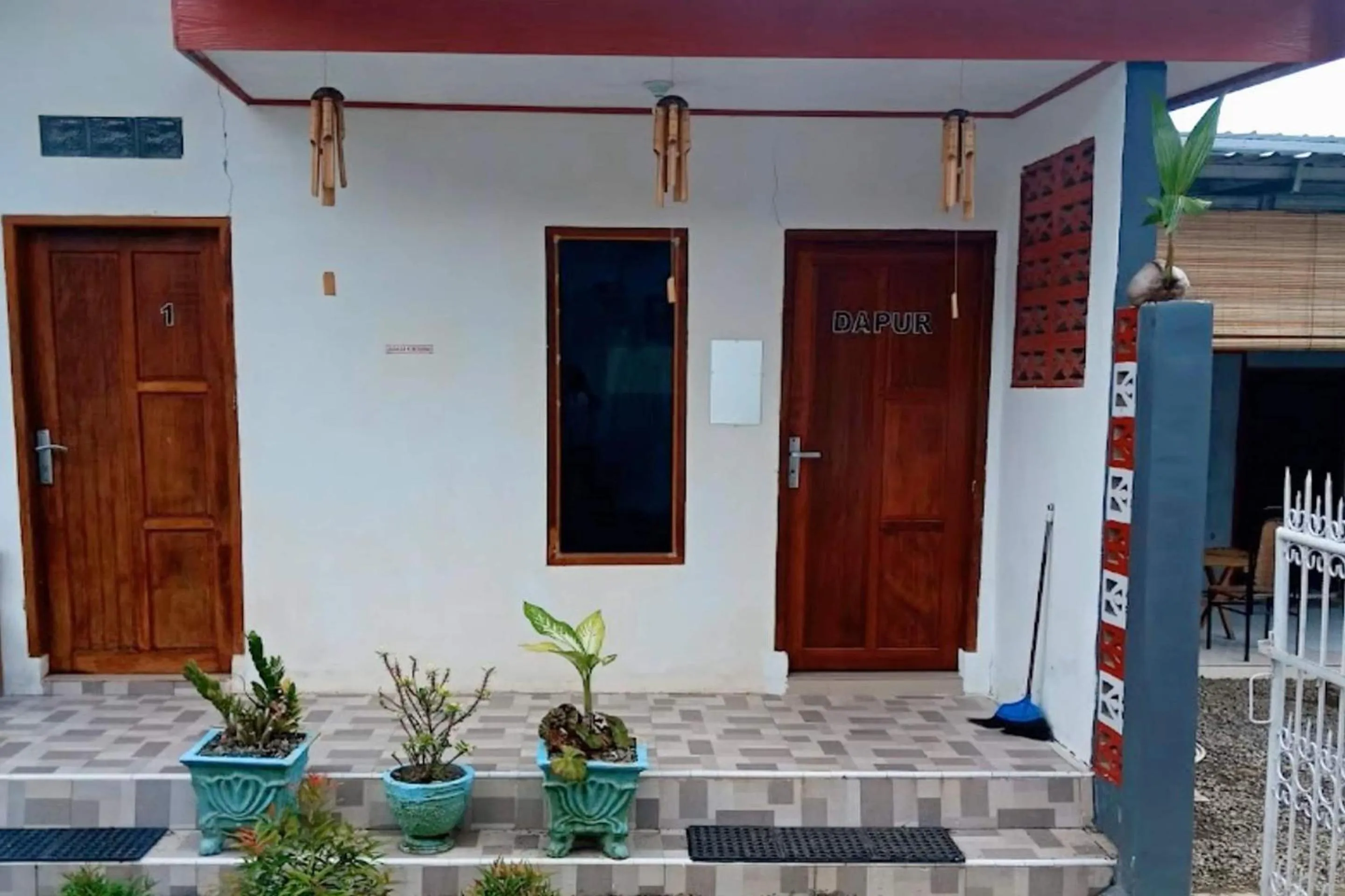 Facade/entrance in Hotel O Kost Reski 1 Near Pasar Rakyat Limbung