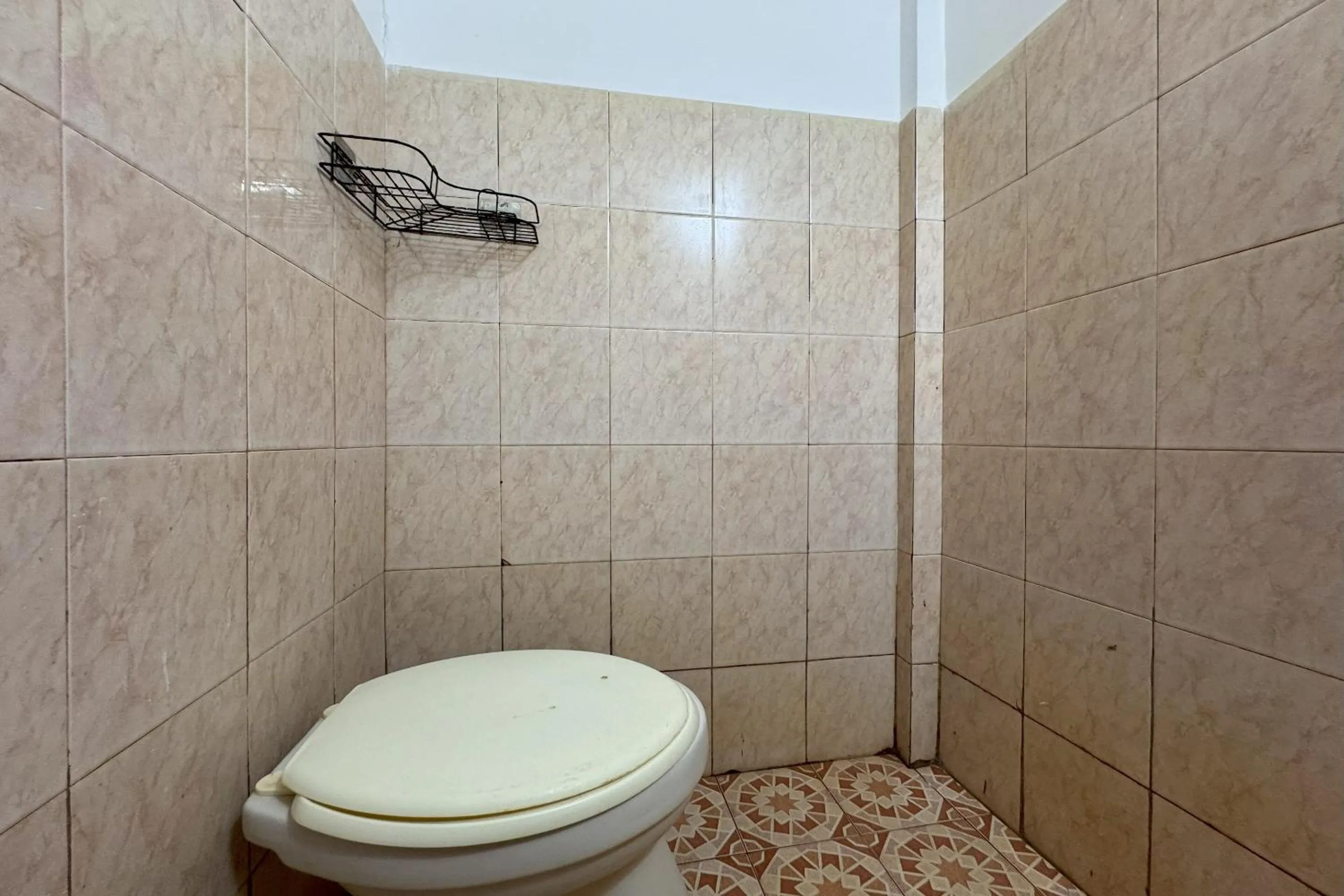 Bathroom in Hotel O Kost Reski 1 Near Pasar Rakyat Limbung