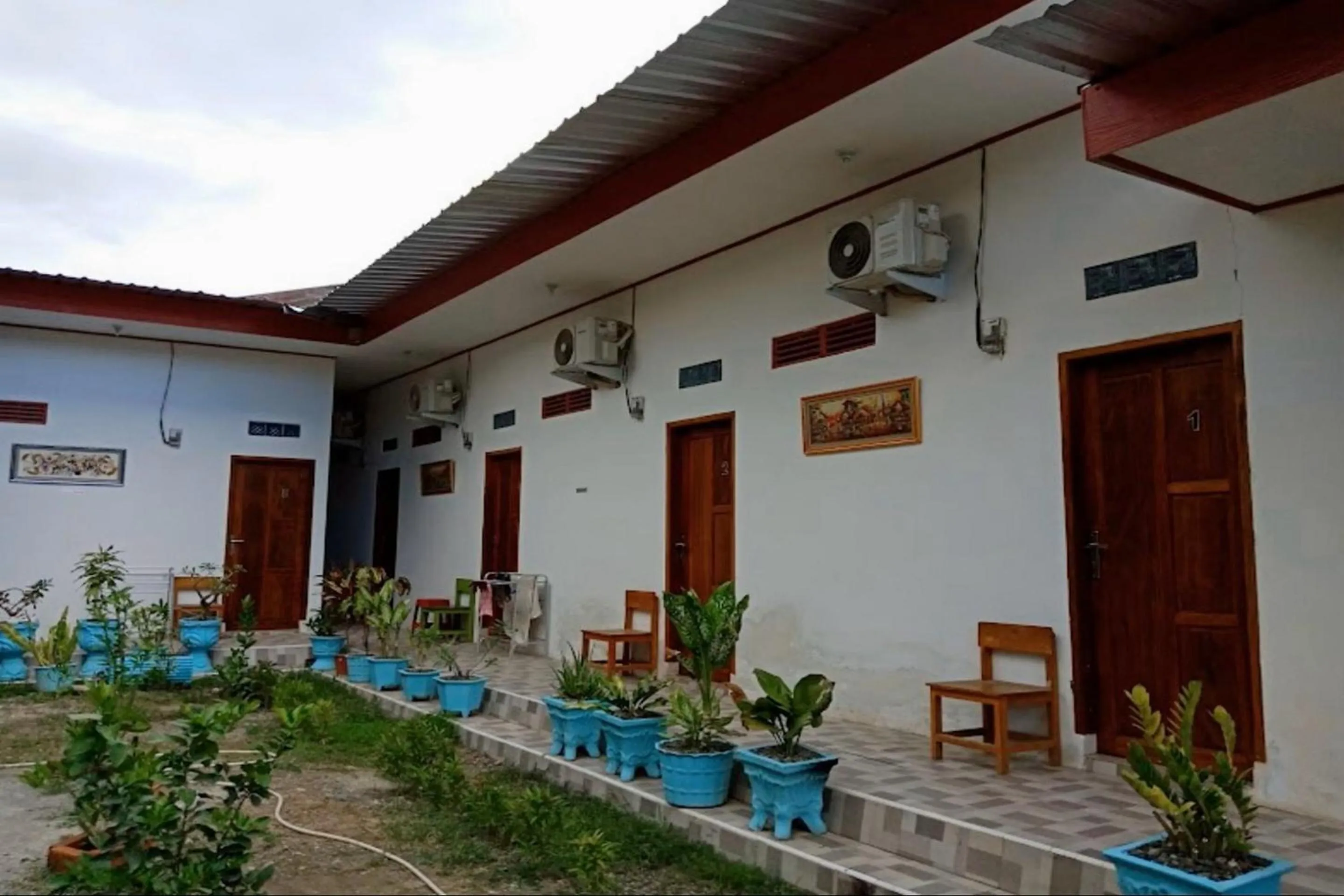Facade/entrance in Hotel O Kost Reski 1 Near Pasar Rakyat Limbung