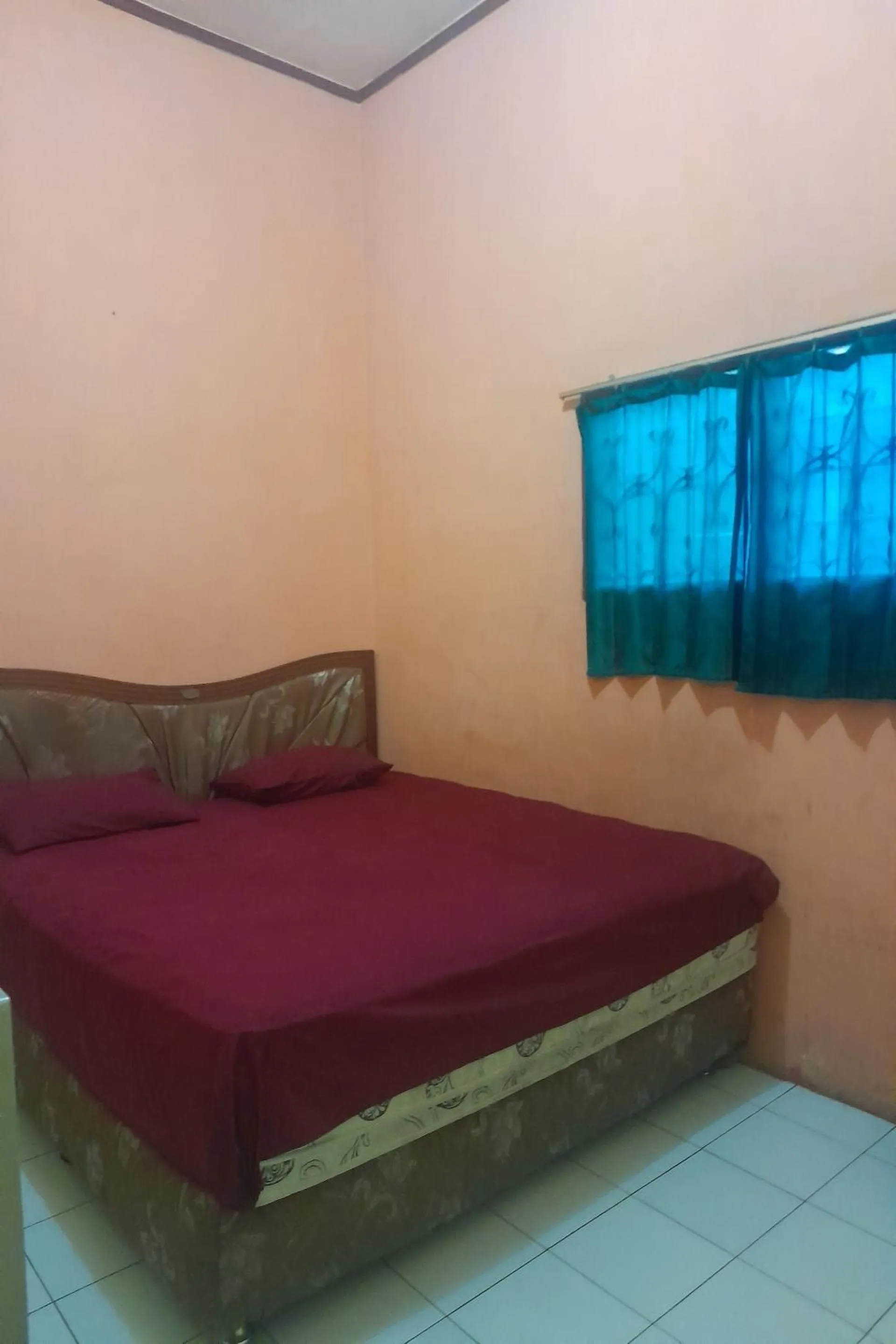 Bedroom, Bed in Hotel O Fermansio Homestay 2