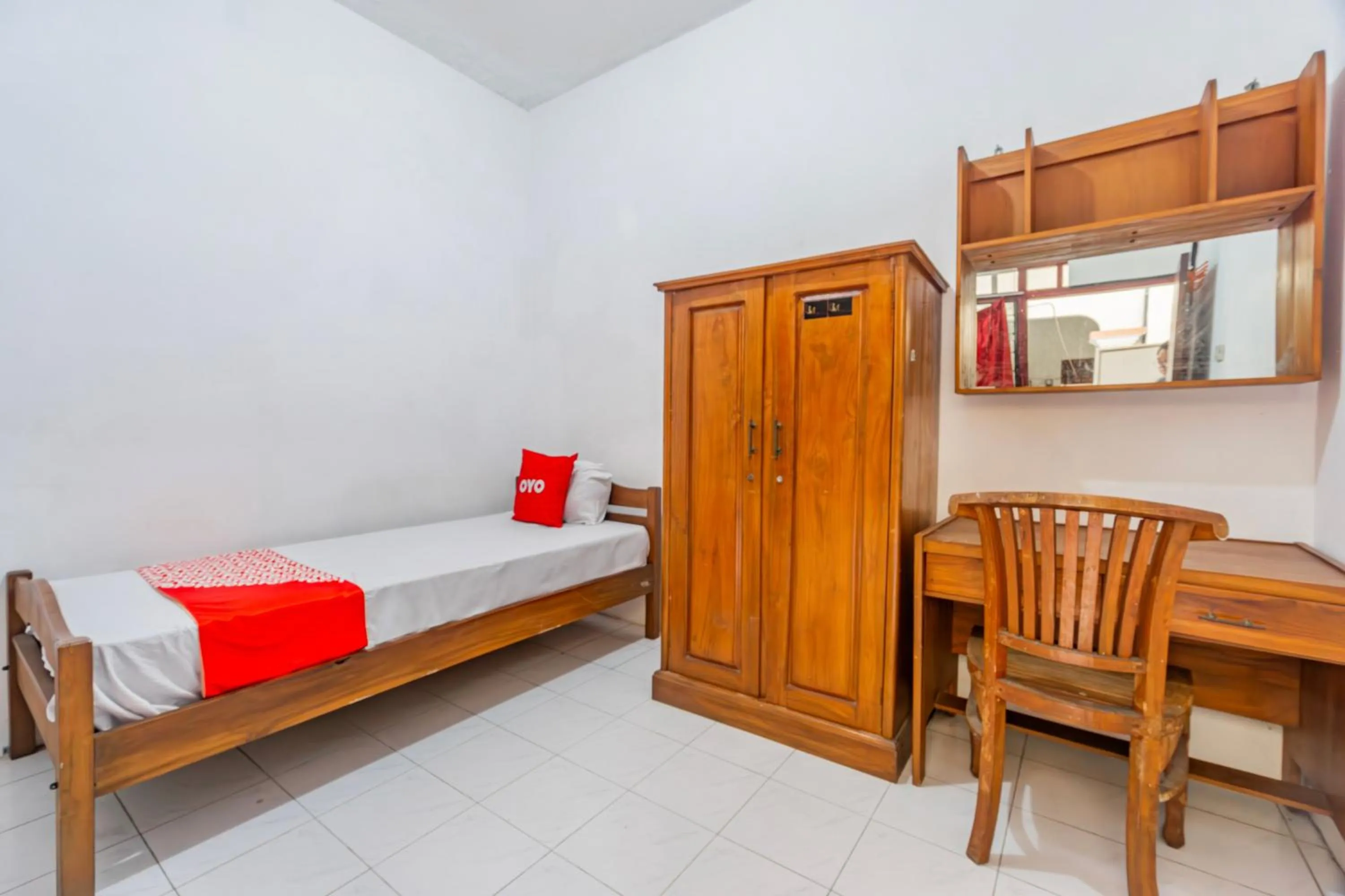 Bedroom, Bed in Hotel O Regina Homestay Syariah