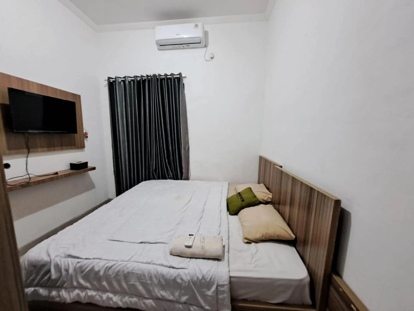 Bedroom in OYO 93870 Damai Guest House Cirebon