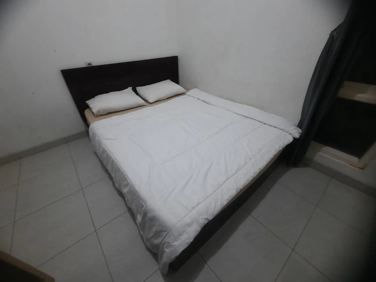 Bedroom in OYO 93870 Damai Guest House Cirebon