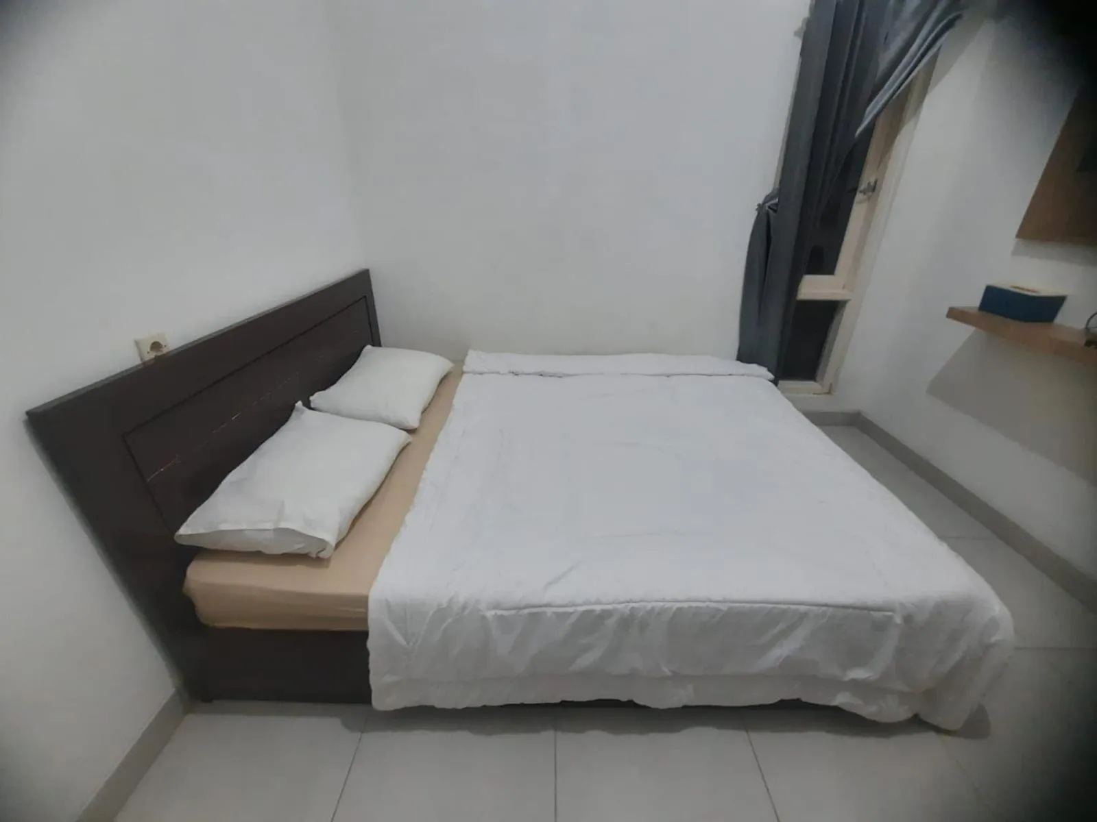 Bedroom in OYO 93870 Damai Guest House Cirebon