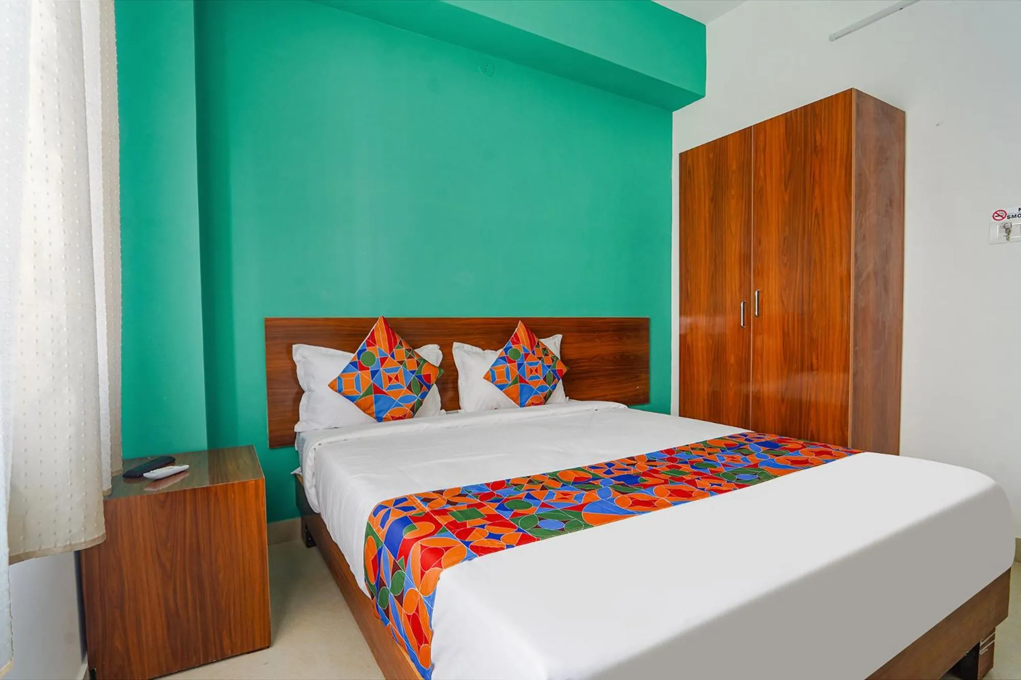 Bed in Via Metro Suites