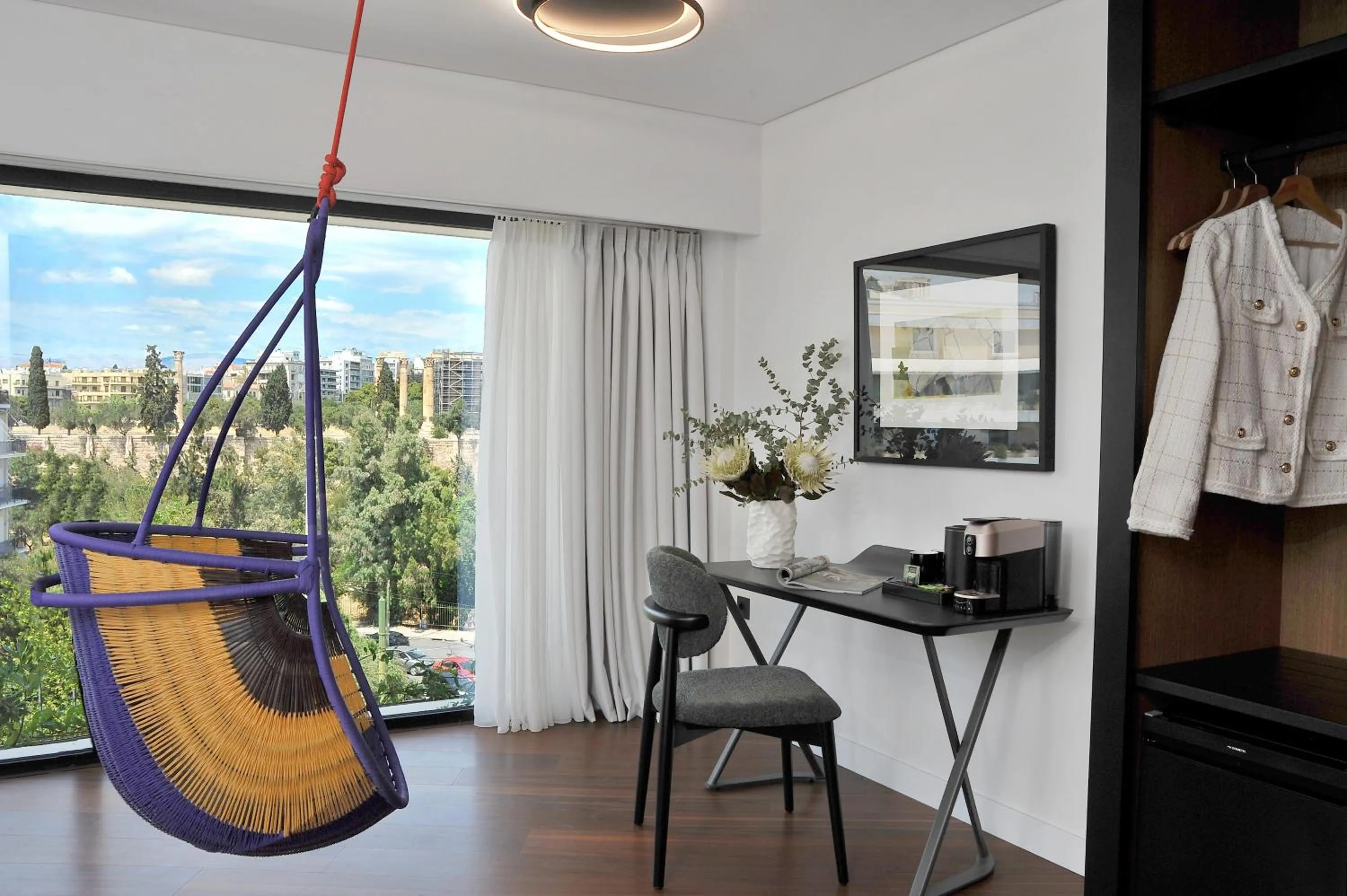 wardrobe in The Athenaeum Luxury Hotel