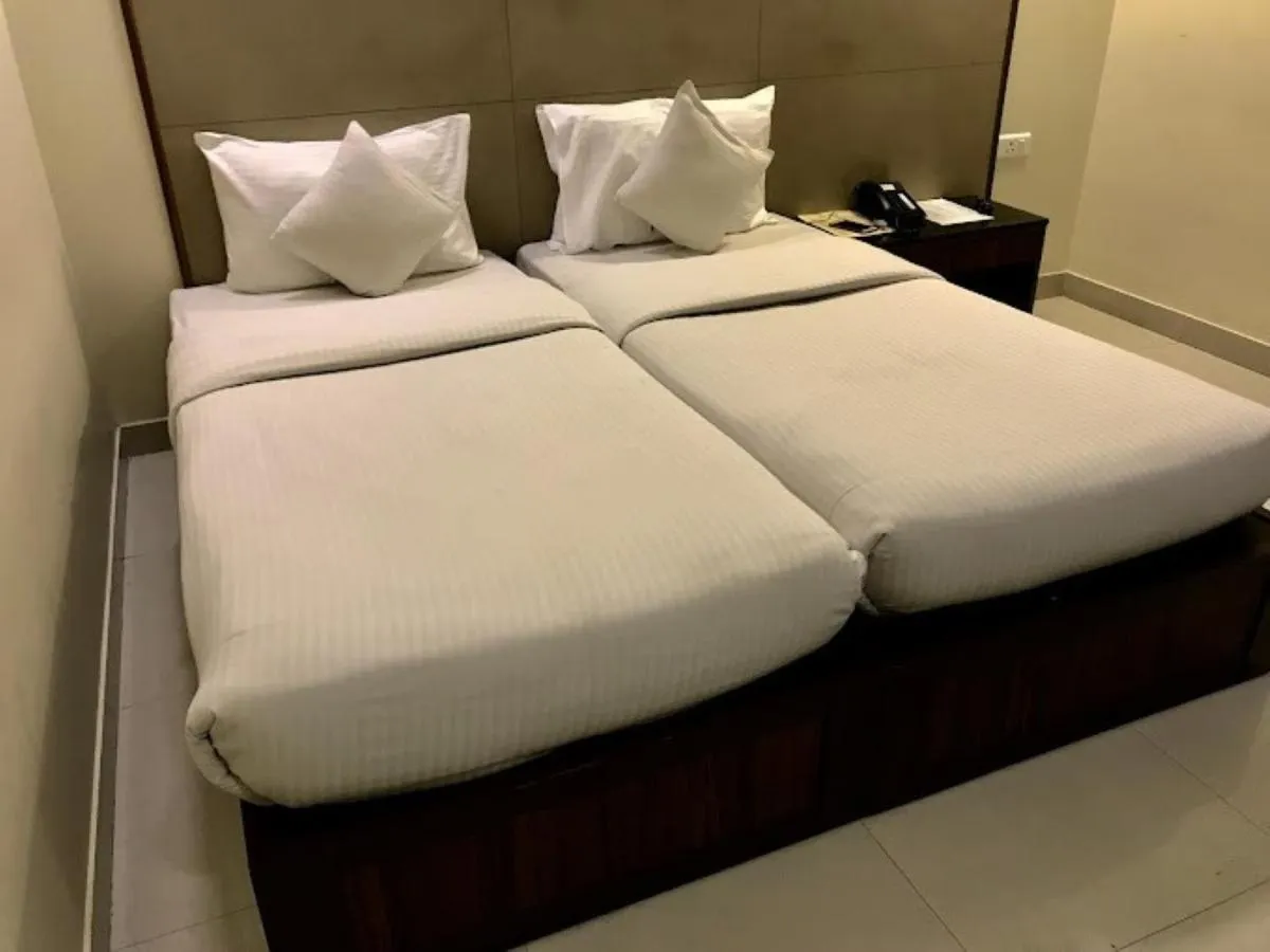 Photo of the whole room, Bed in Hotel Rainbow Ghaziabad