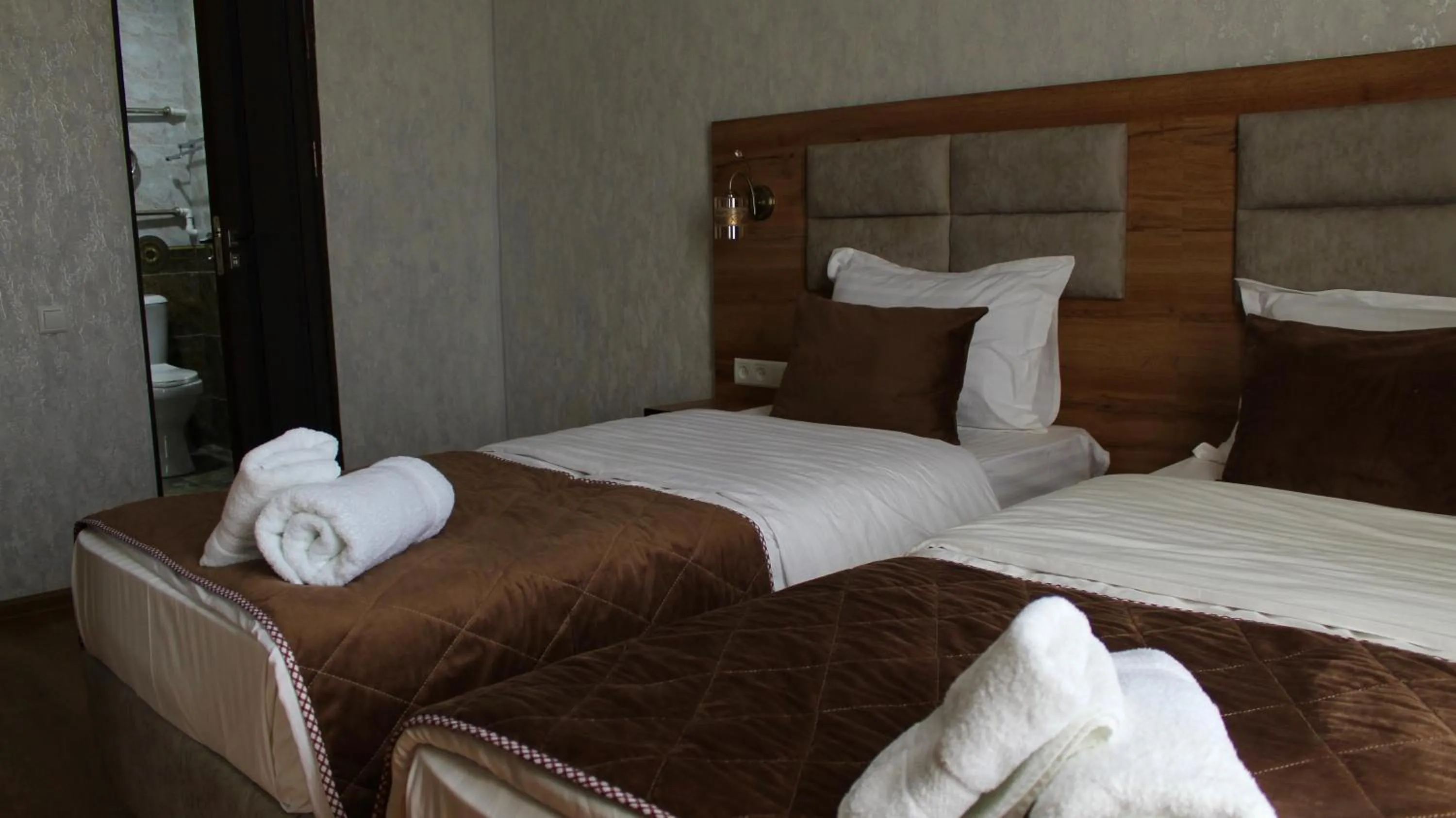 Bed in Grand Shosh Hotel