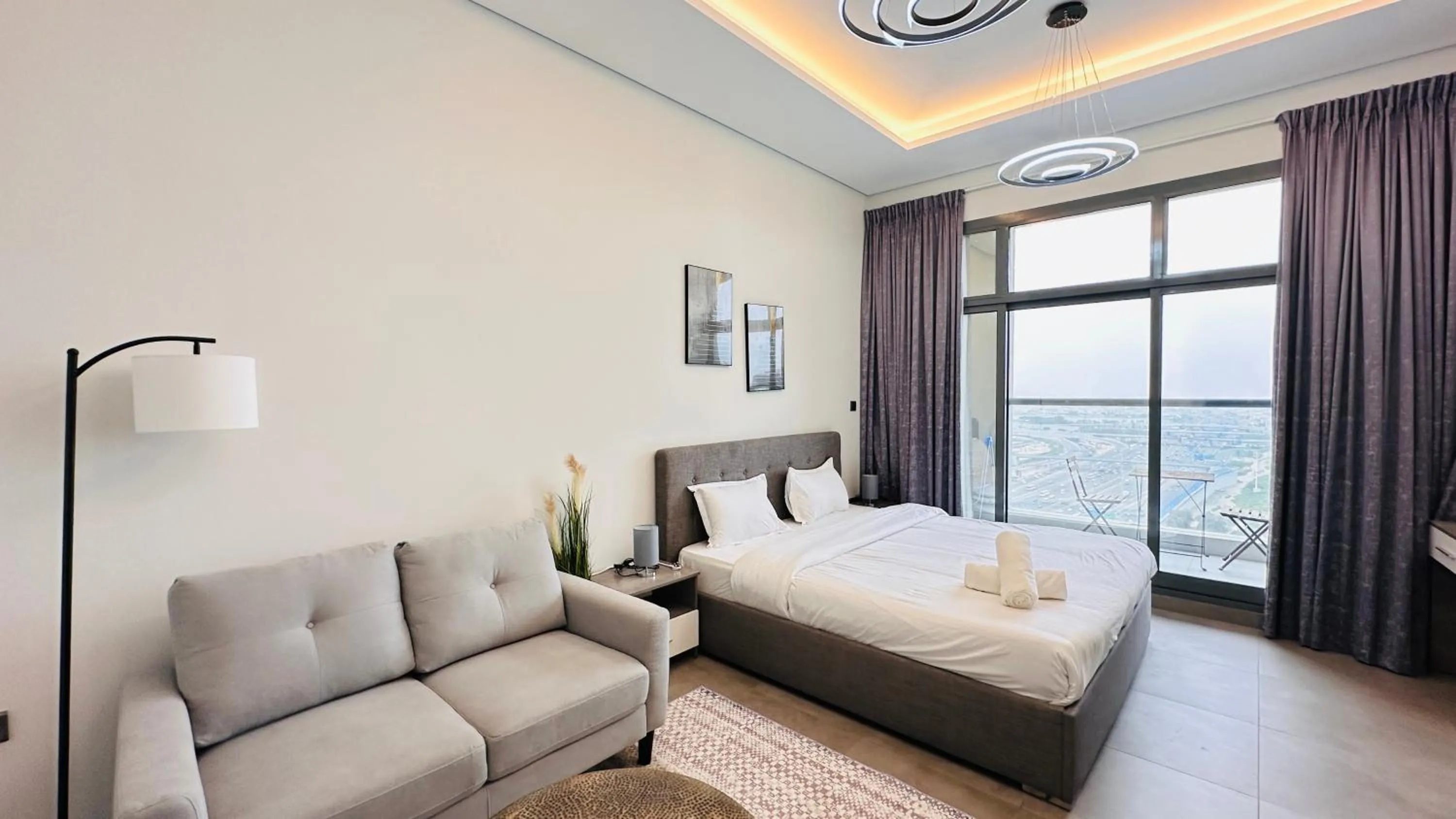 Bedroom, Bed in Spacious Studio Apartment Burj View with Balcony Free Parking by Belvilla