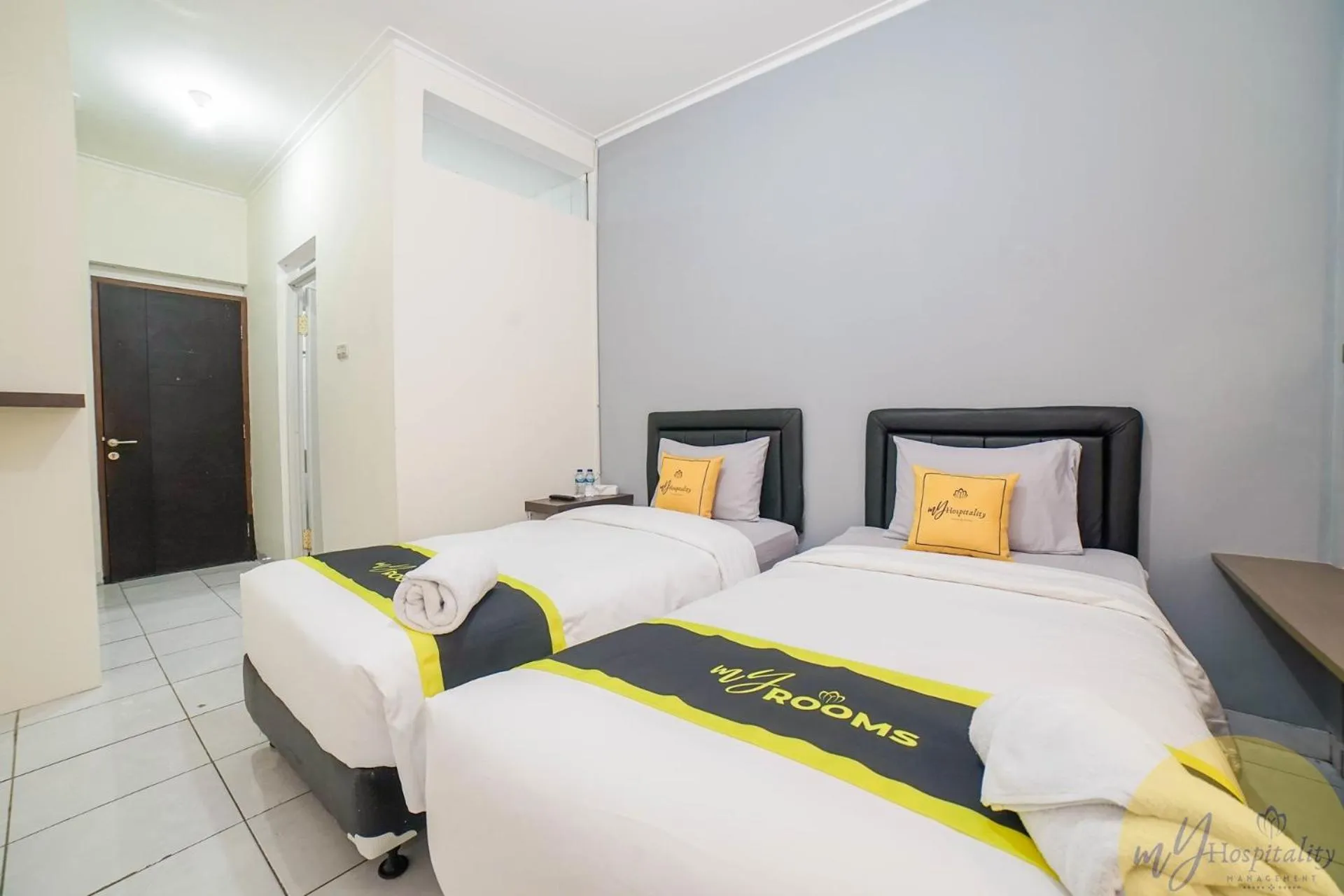 Bed in Fortuna Hotel & Residence by My Hospitality