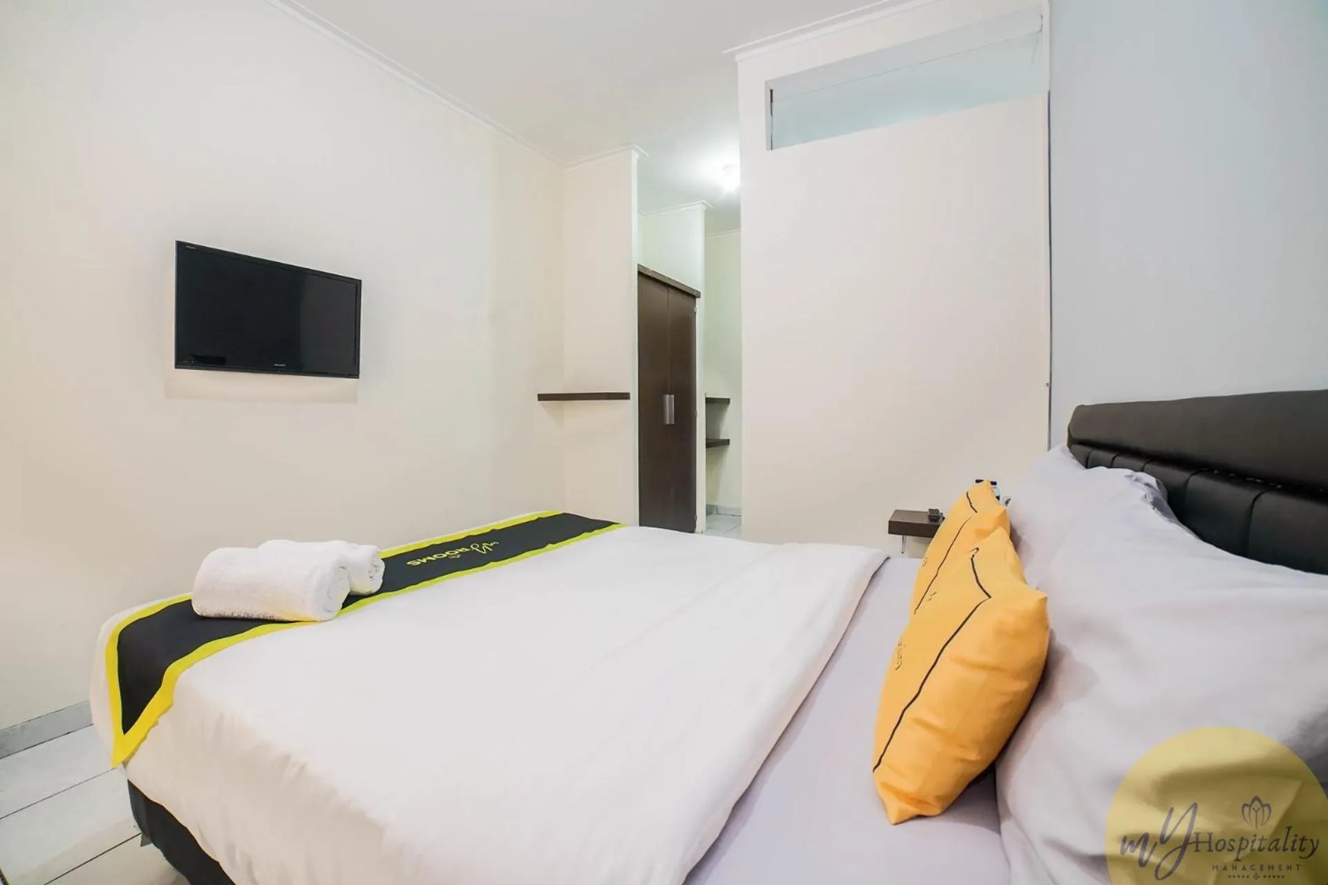 Bed in Fortuna Hotel & Residence by My Hospitality