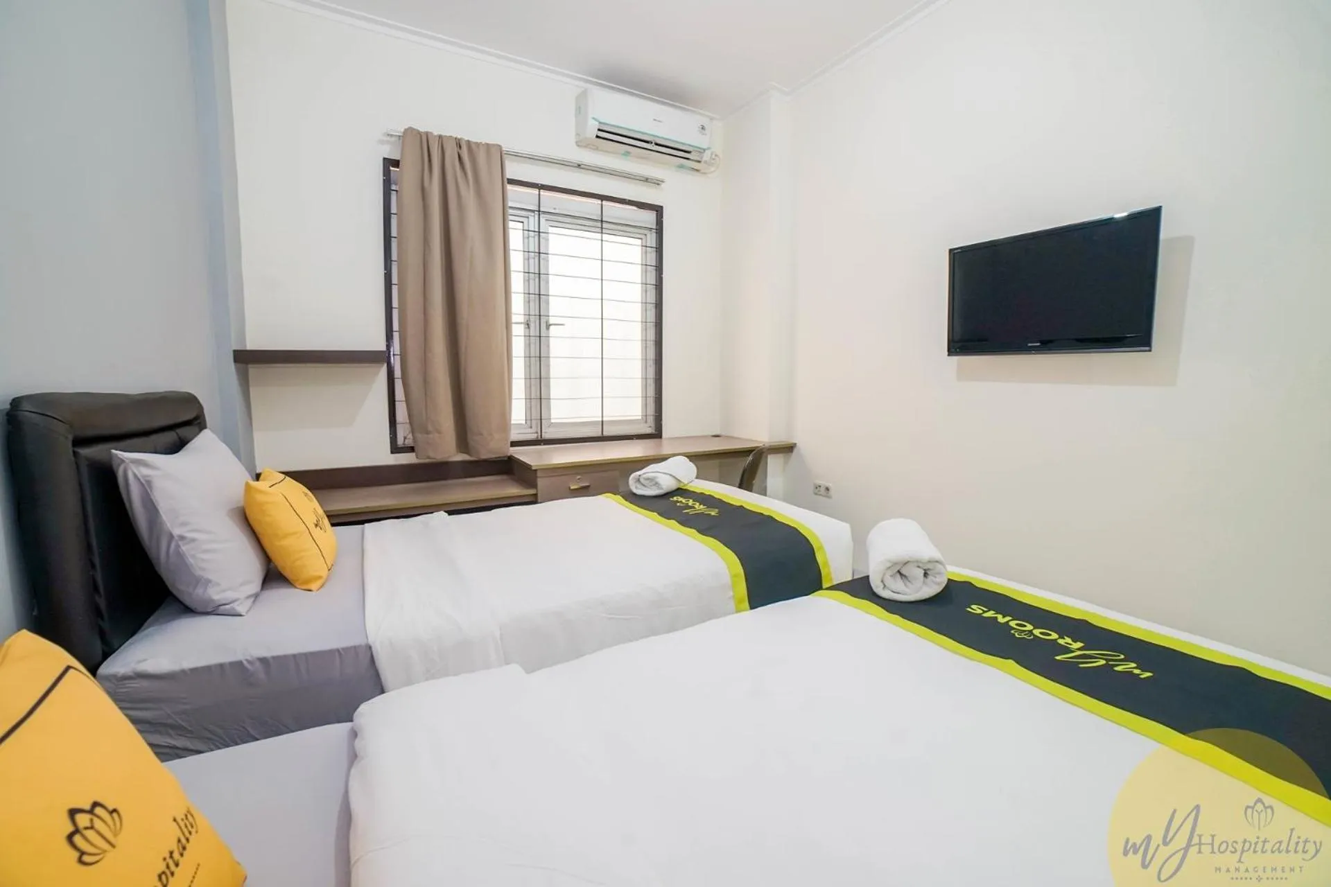 Bed in Fortuna Hotel & Residence by My Hospitality