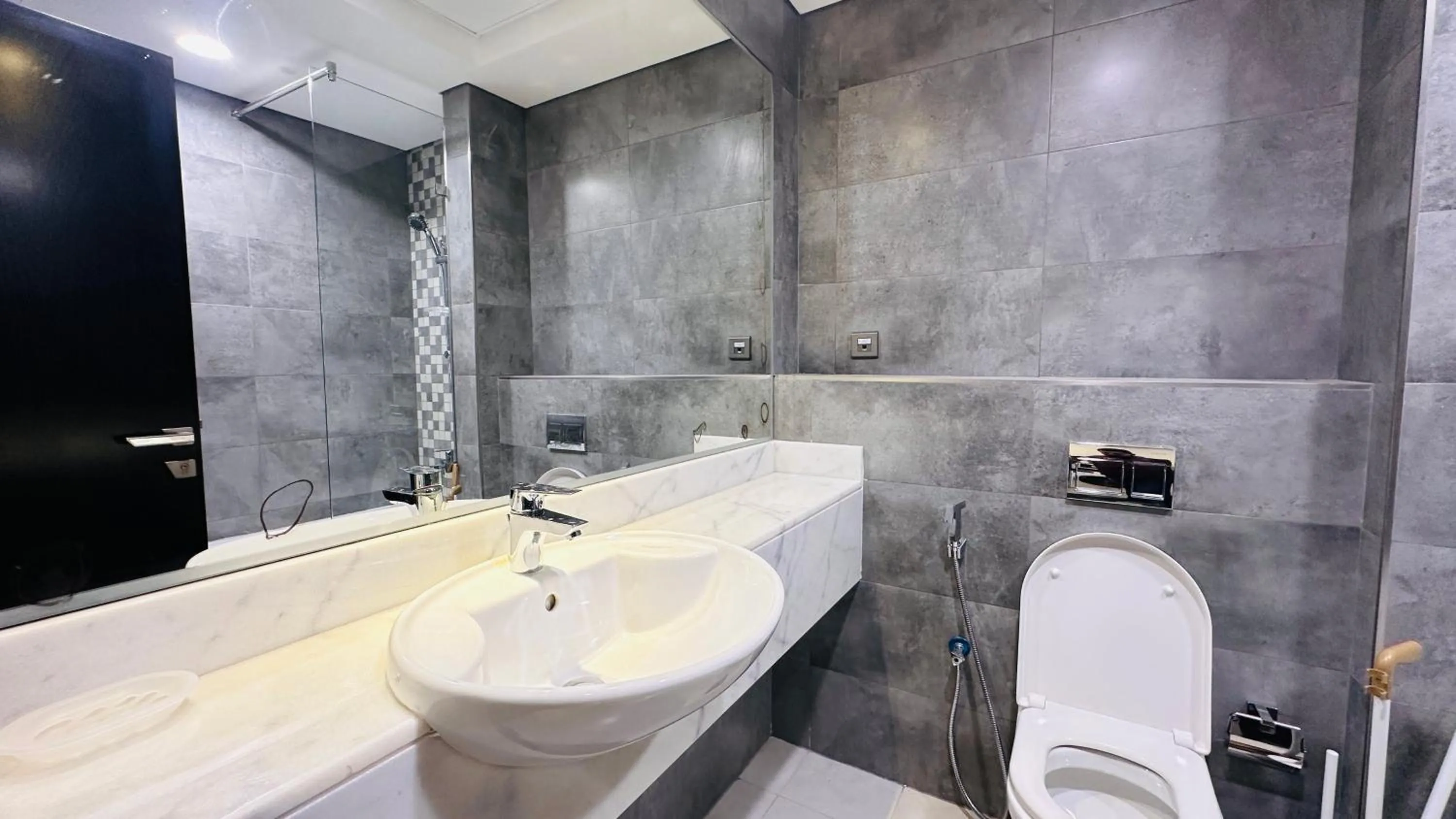 Bathroom in Upscale Studio Apartment Burj View with Balcony Free Parking by Belvilla
