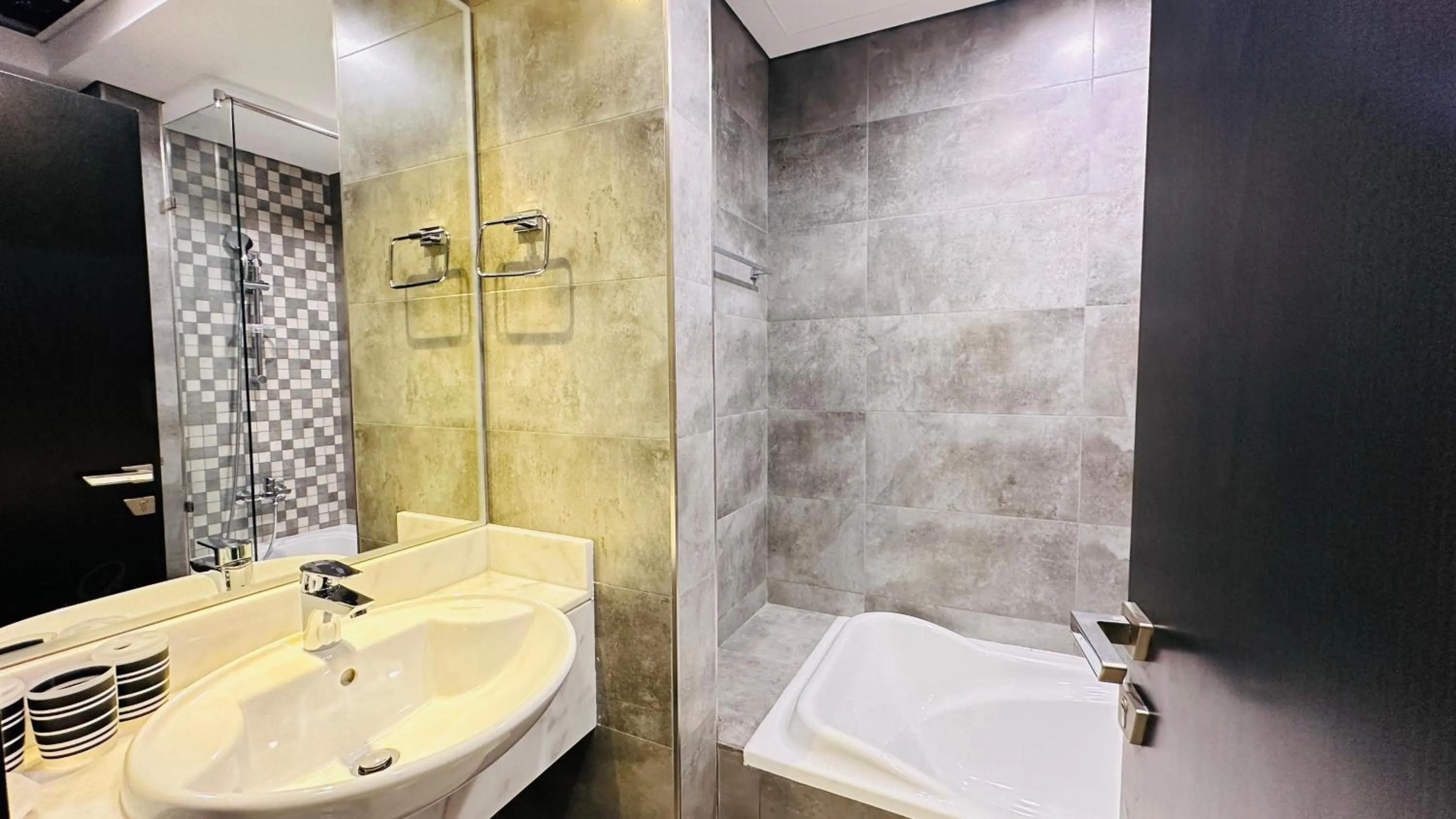 Bathroom in Upscale Studio Apartment Burj View with Balcony Free Parking by Belvilla
