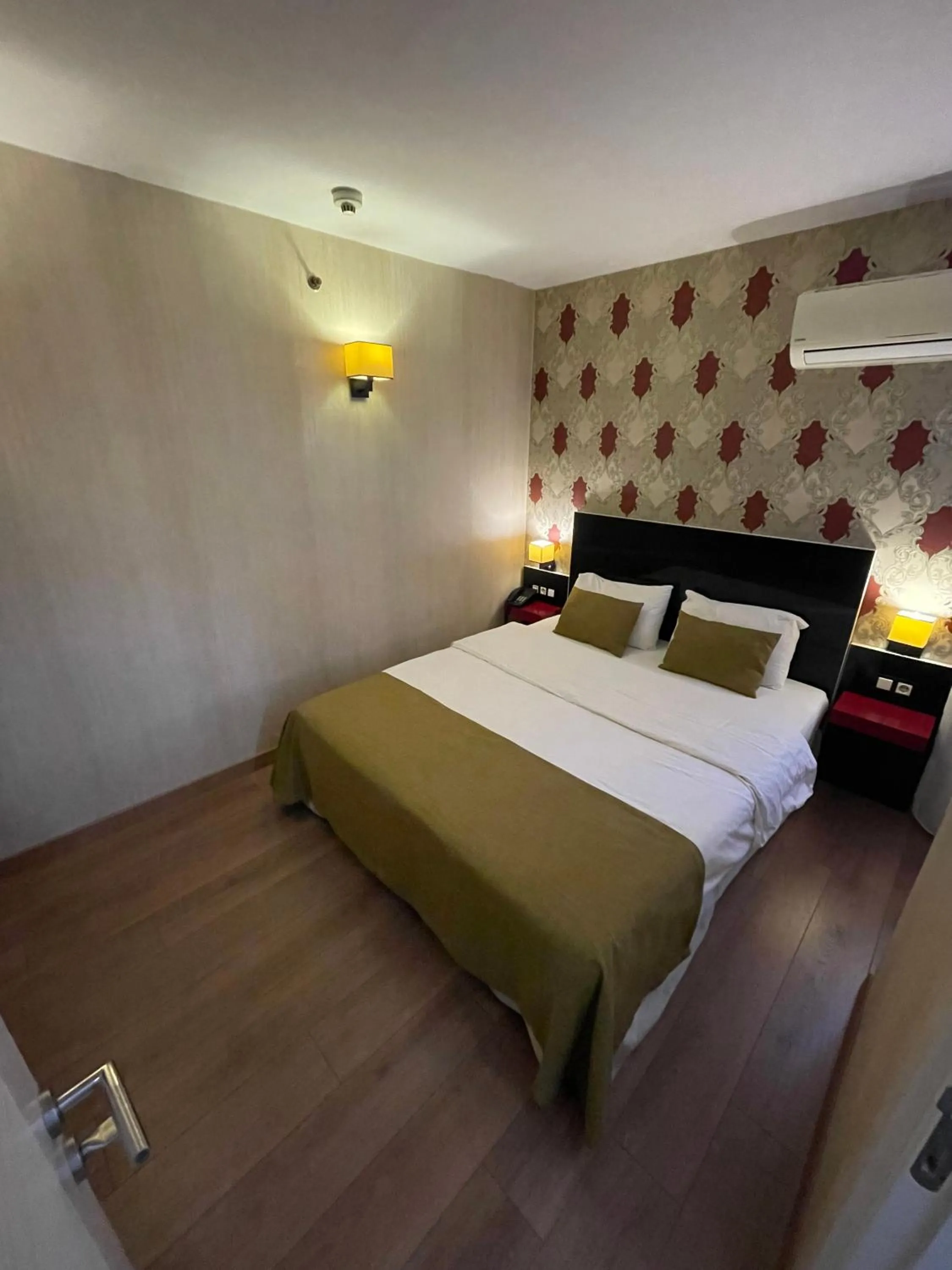 Bed in Era Palace Hotel