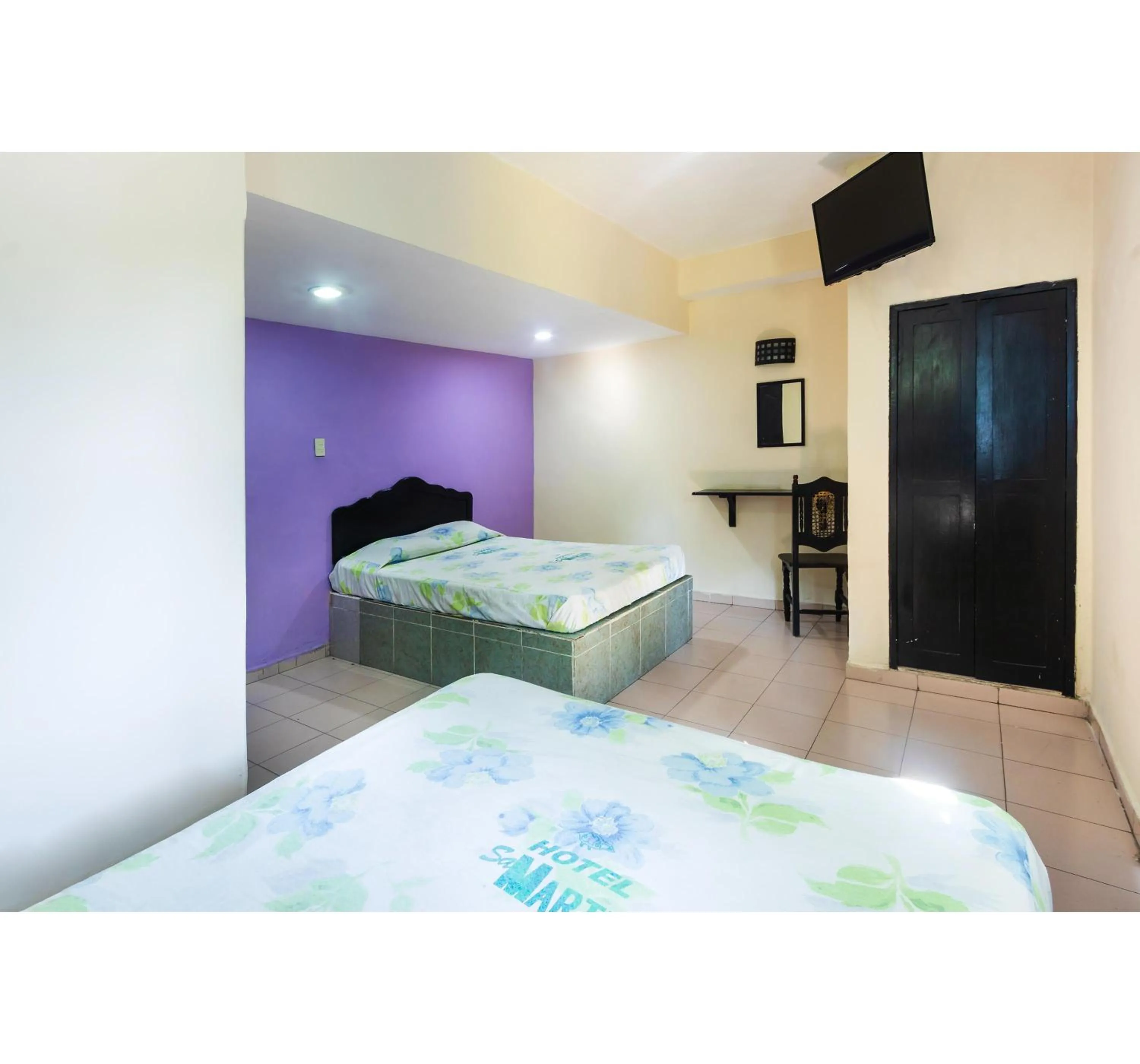 Bedroom in OYO Hotel San Martin