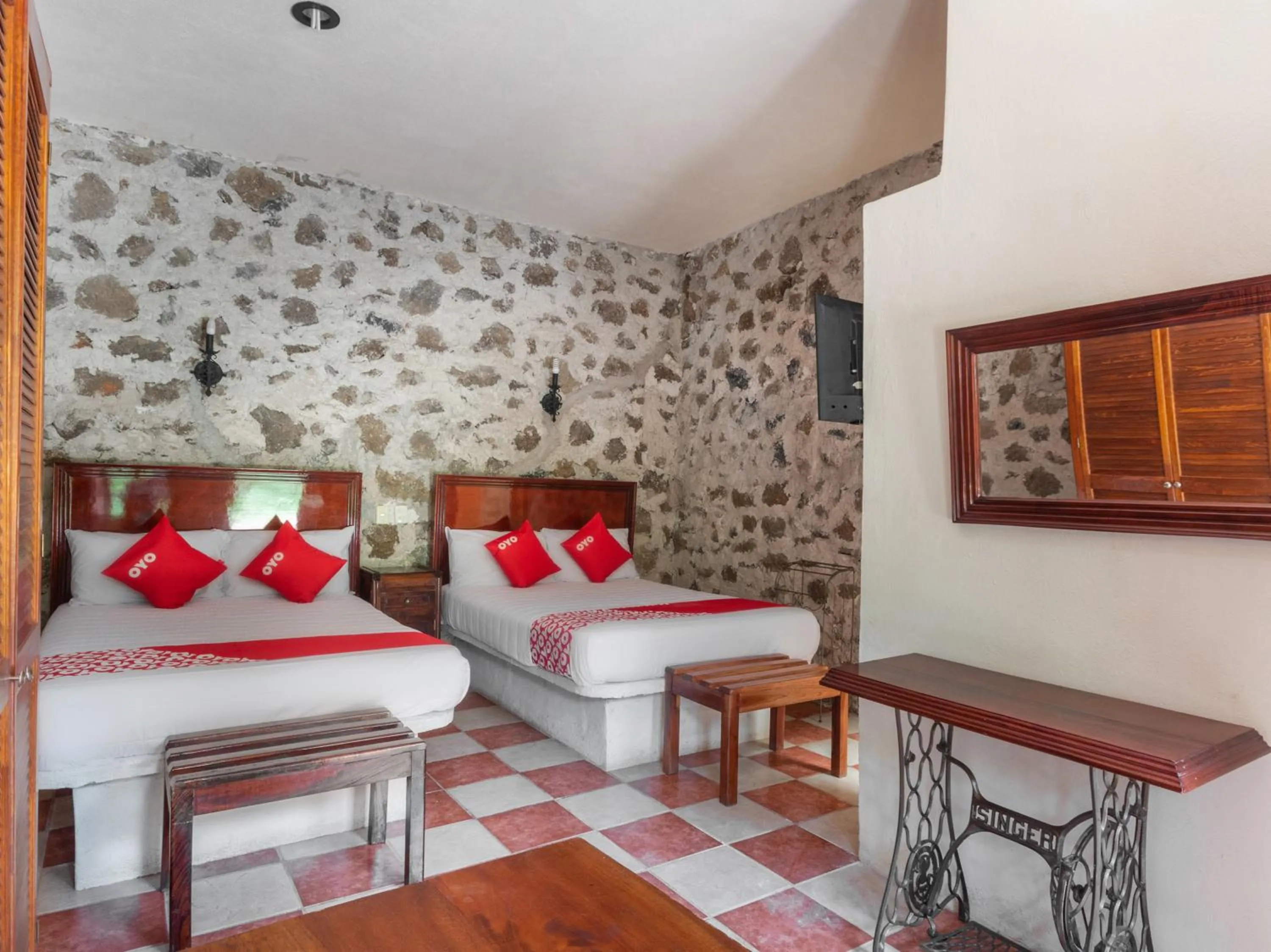 Bed in Rancho Hotel El Carmen