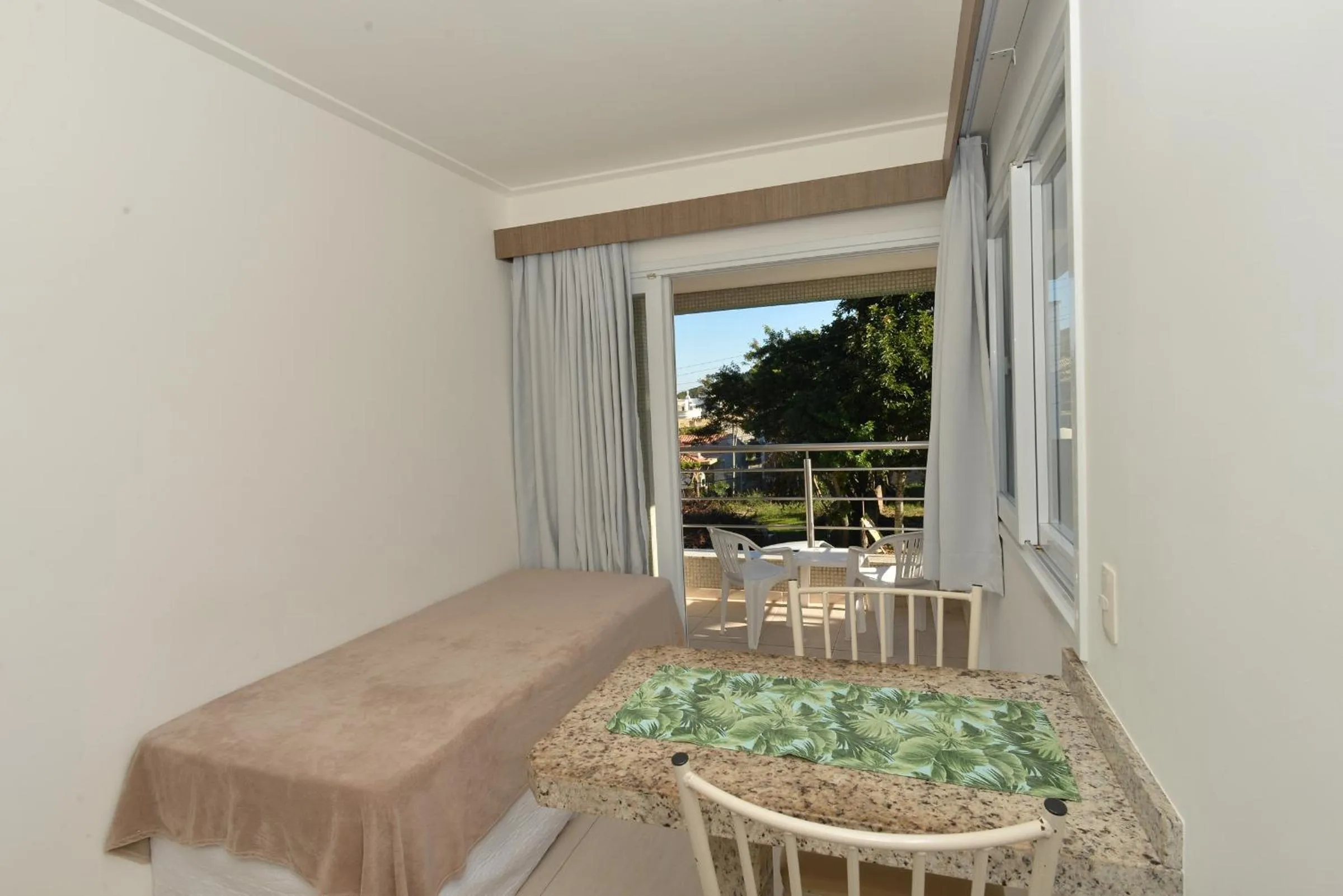 Kitchen or kitchenette, Bed in Pousada Villa Maciel