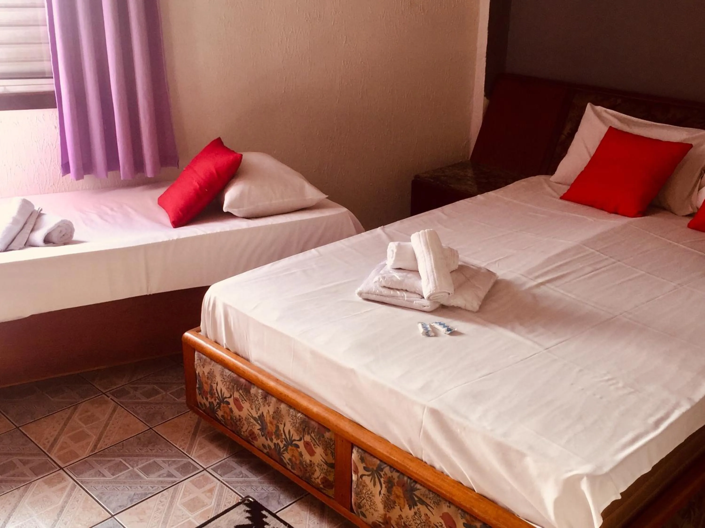 Bed in Hotel Cambará