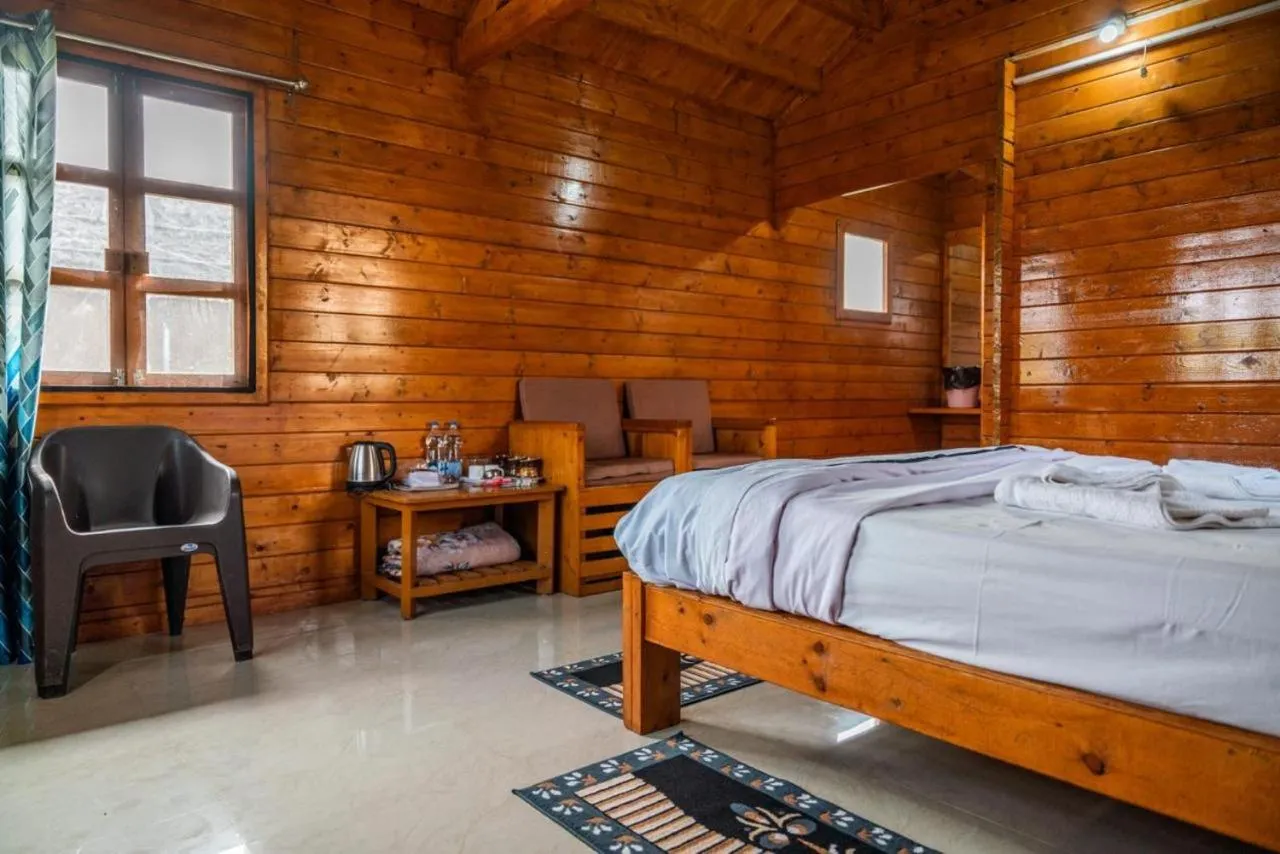 Bed in Leo wooden resorts