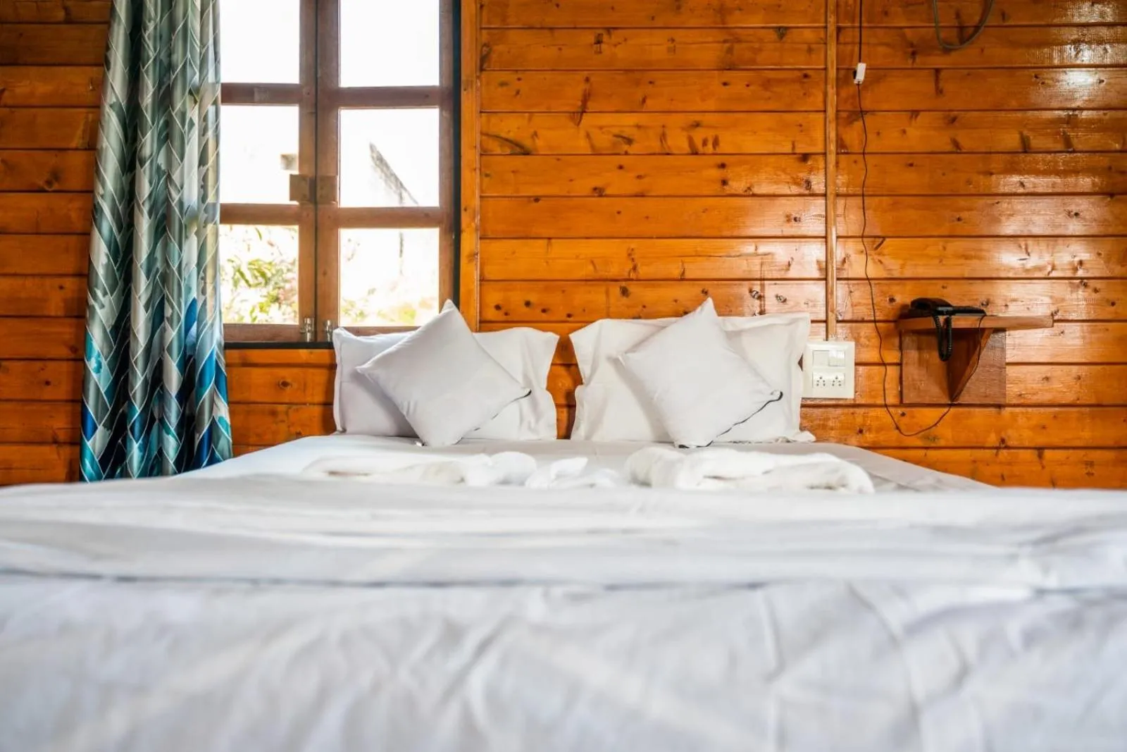 Bed in Leo wooden resorts