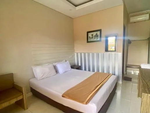 Bed in Roemah kita hotel