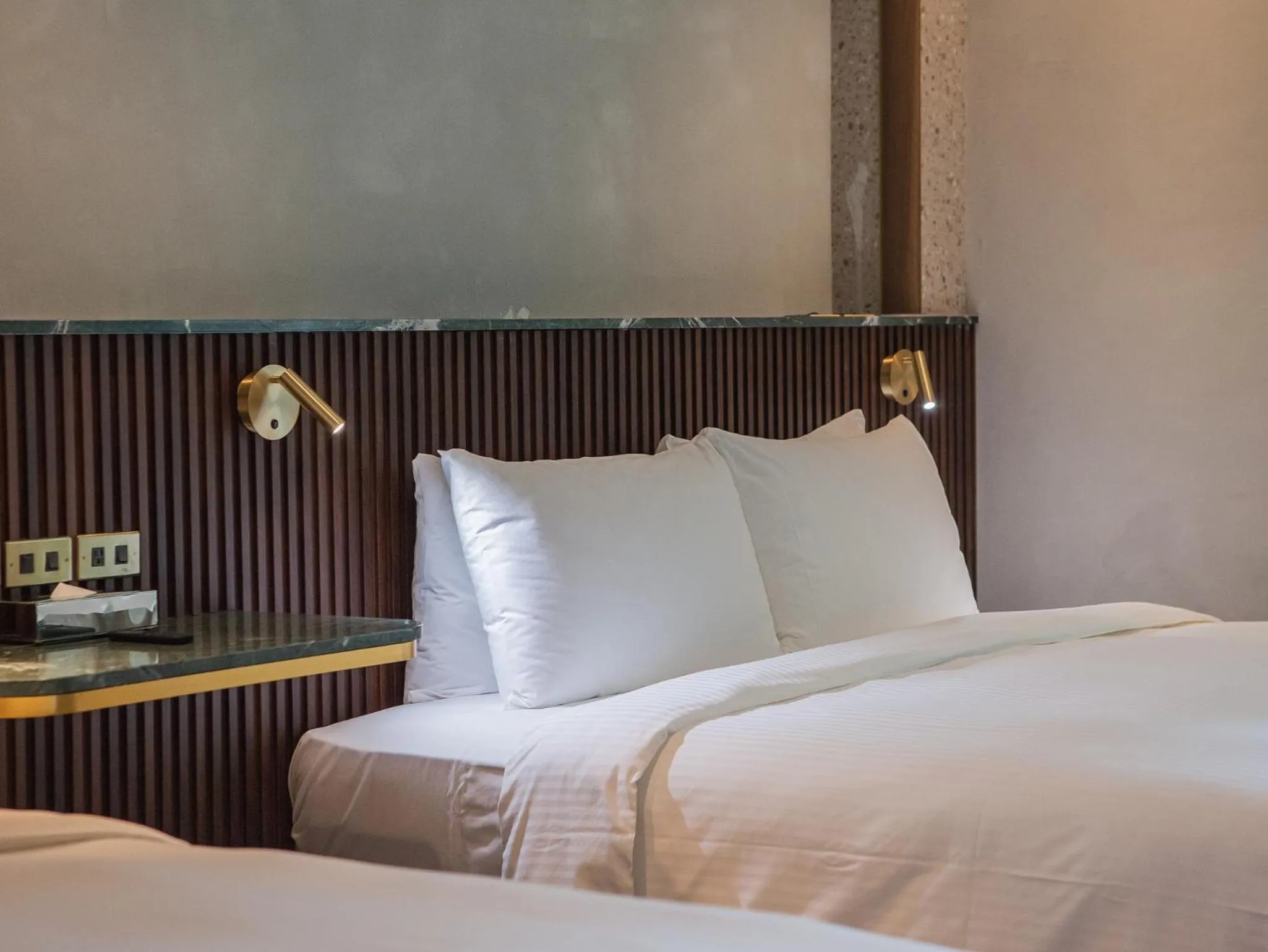 Bed in PAPO'A Harbor Hotel