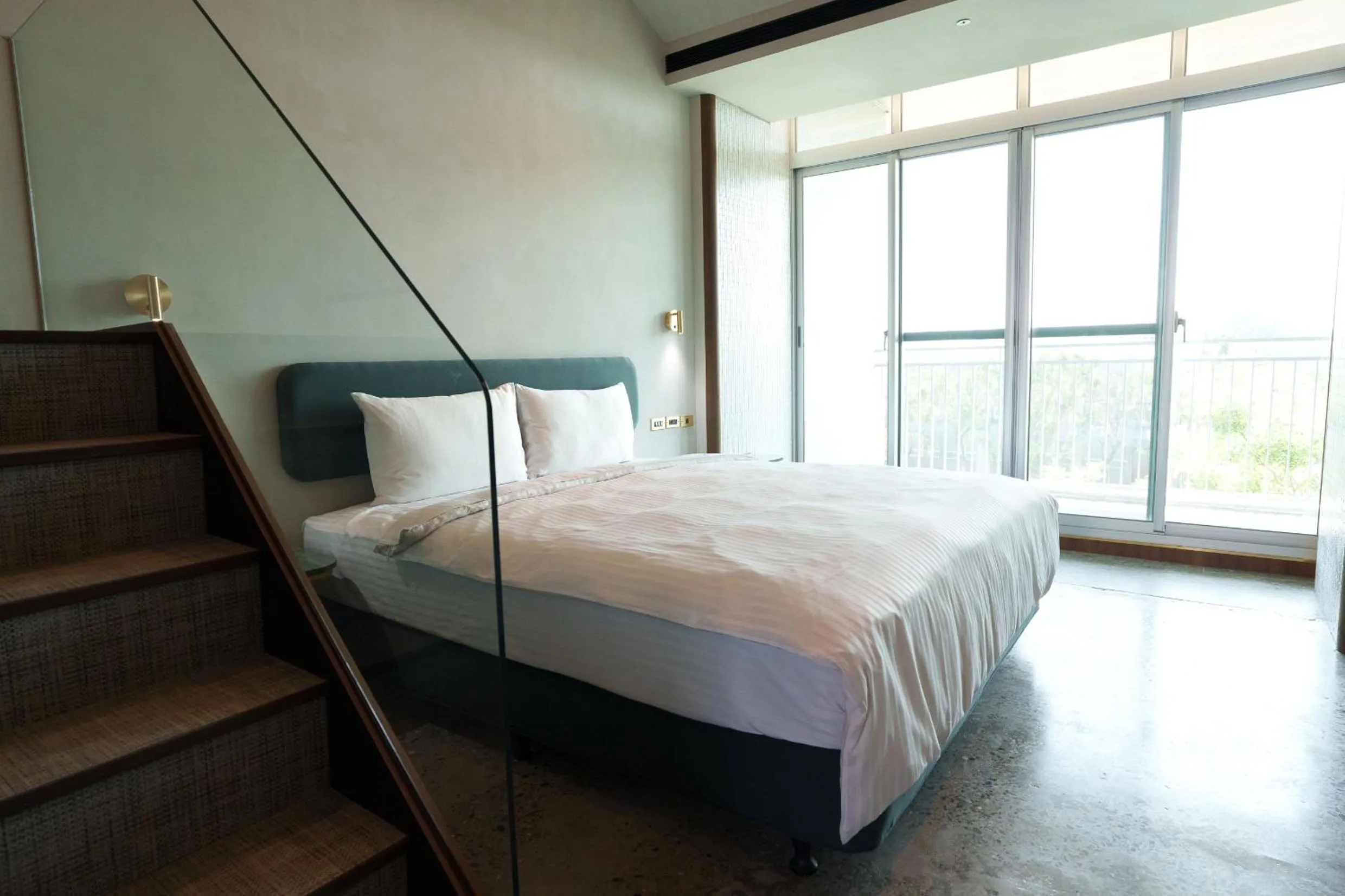 Photo of the whole room, Bed in PAPO'A Harbor Hotel