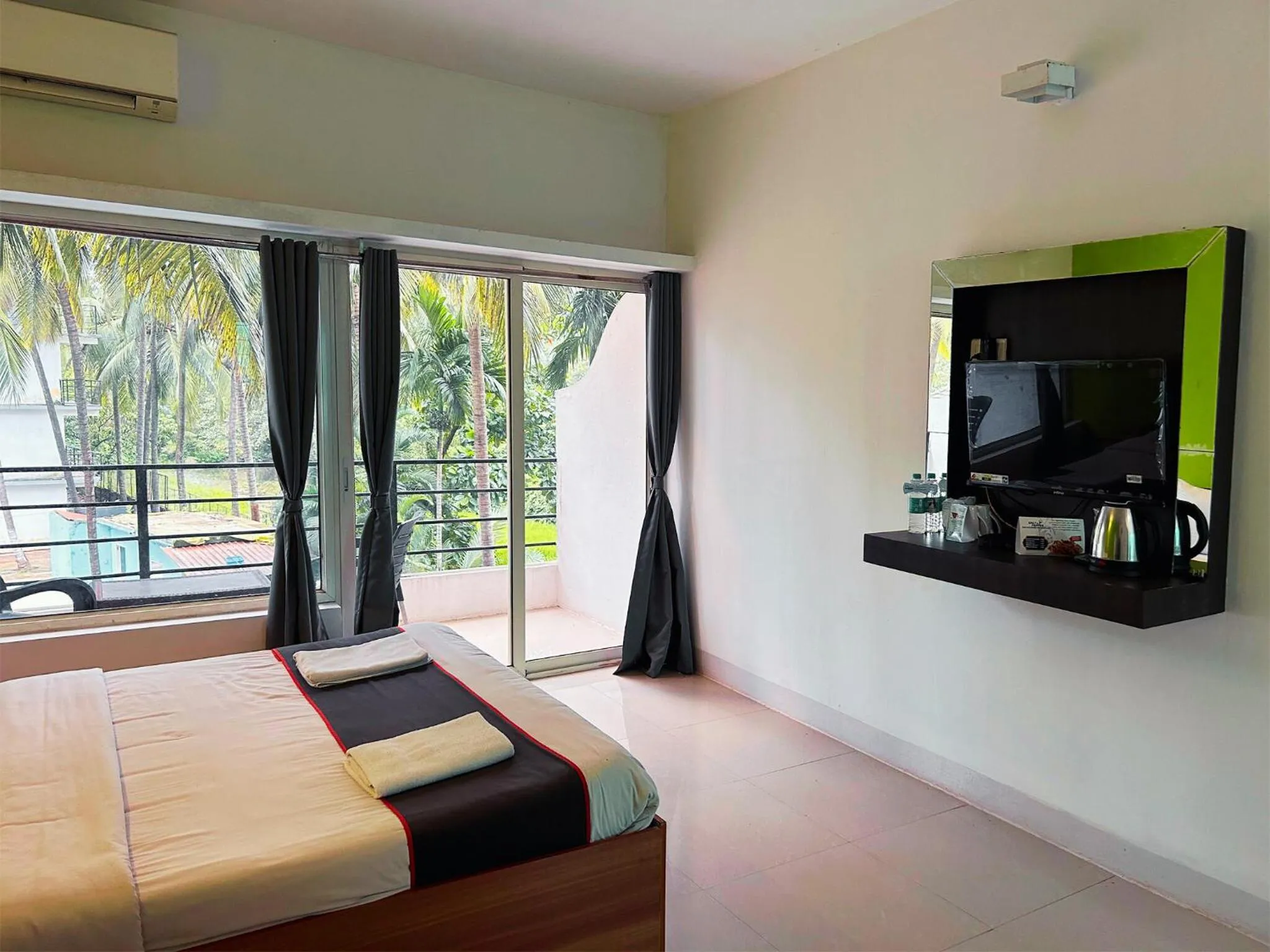 Bed in Bay Breeze Resorts & Hotels