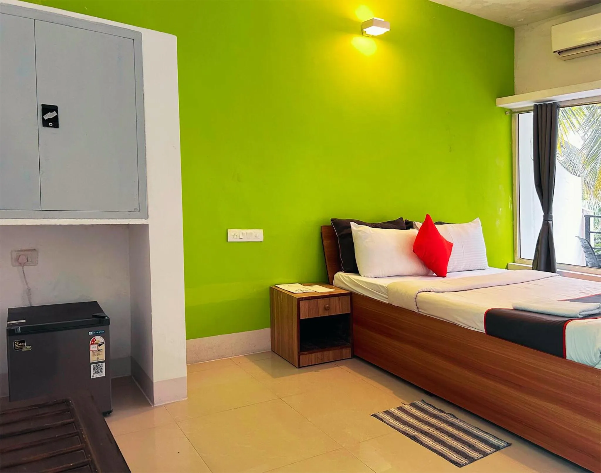 Bed in Bay Breeze Resorts & Hotels