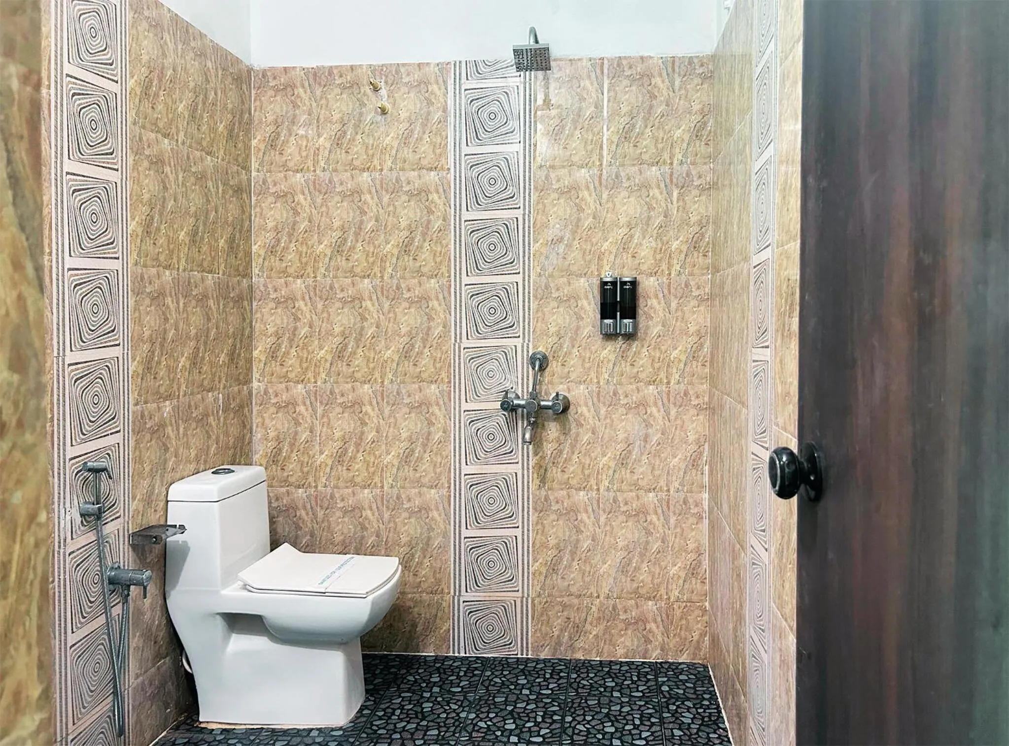 Toilet in Bay Breeze Resorts & Hotels