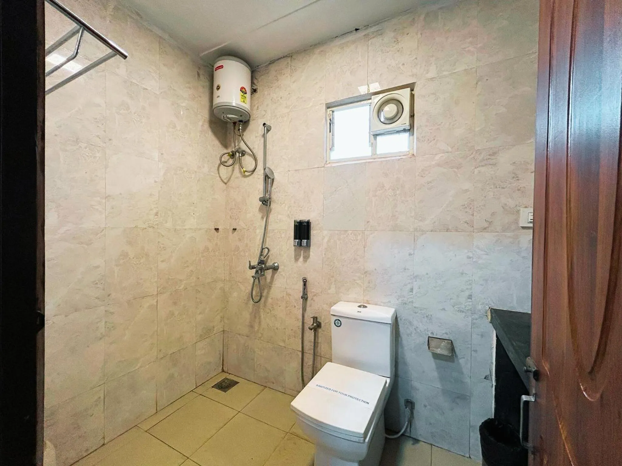 Toilet in Bay Breeze Resorts & Hotels