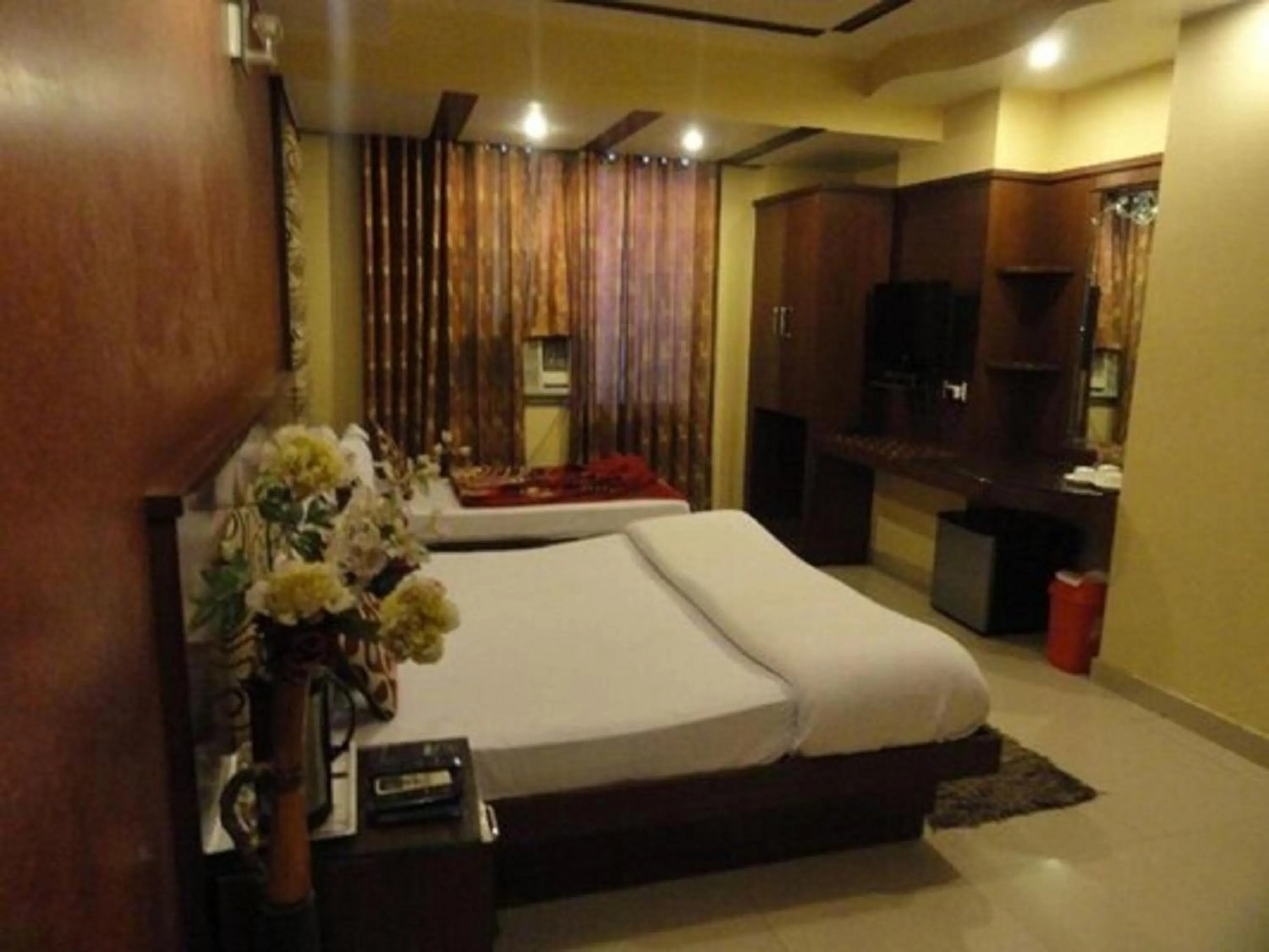 Bed in Hotel Shivdev International